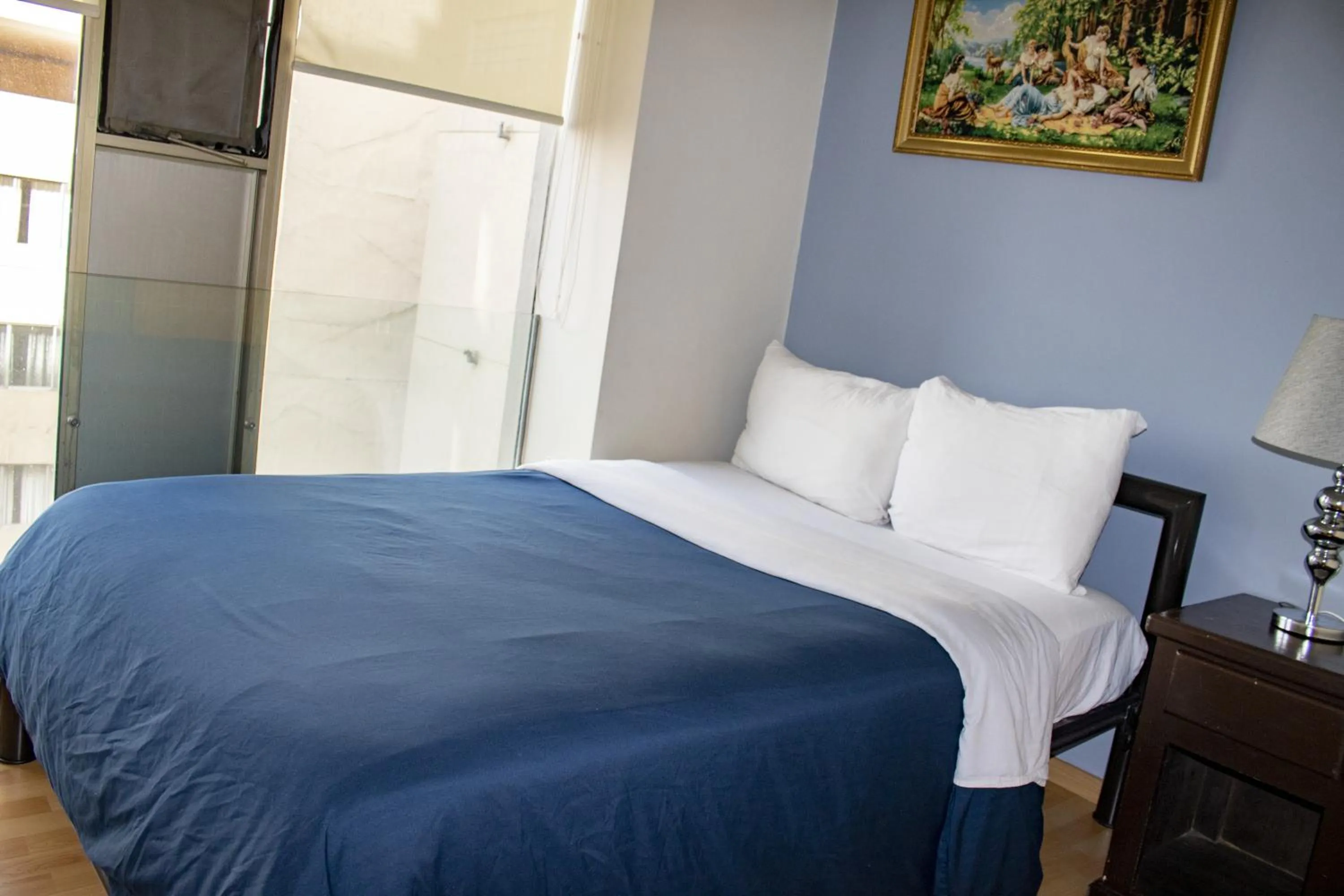 Bed in Puerta Alameda Suites México