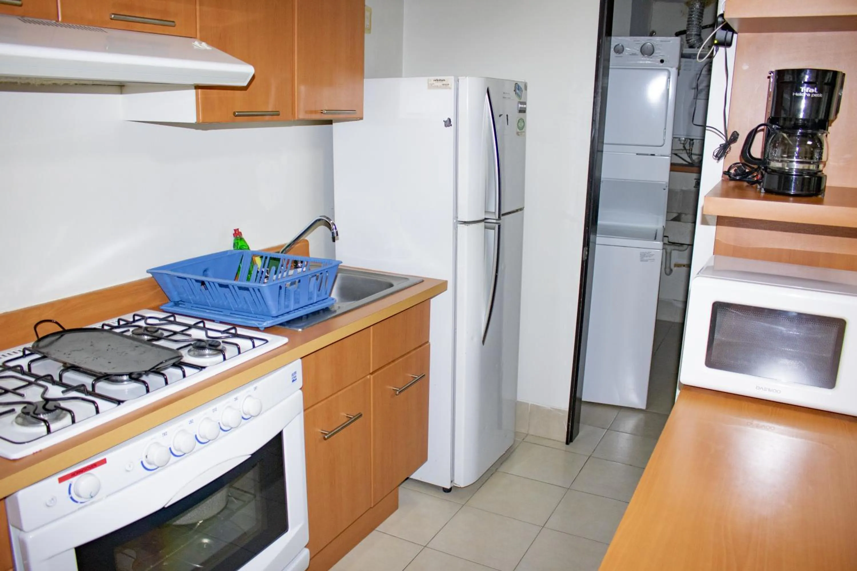 Kitchen or kitchenette in Puerta Alameda Suites México
