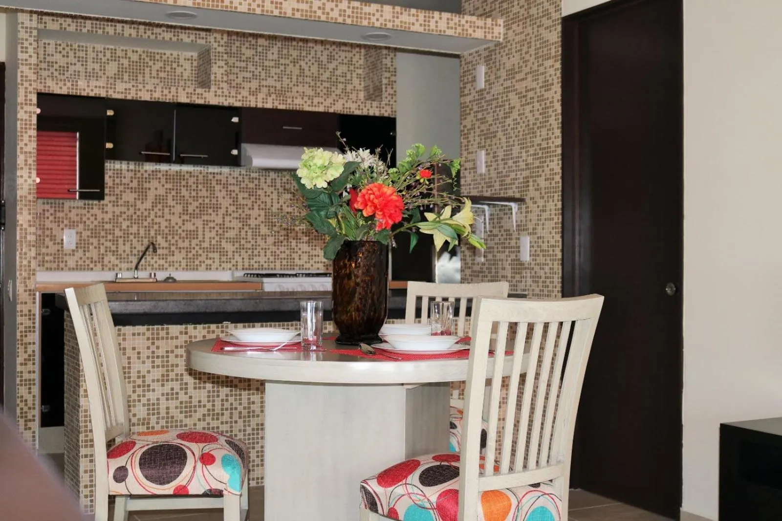 Kitchen or kitchenette in Puerta Alameda Suites México