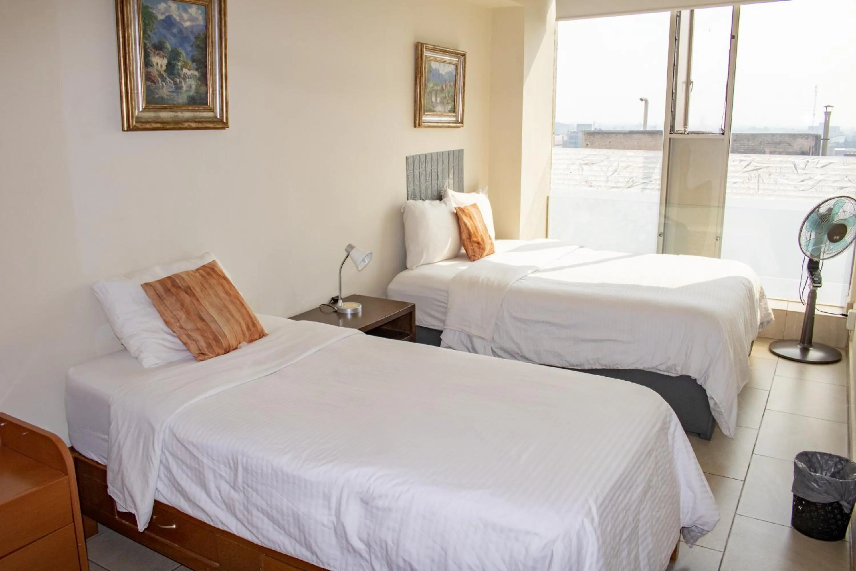 Bed in Puerta Alameda Suites México