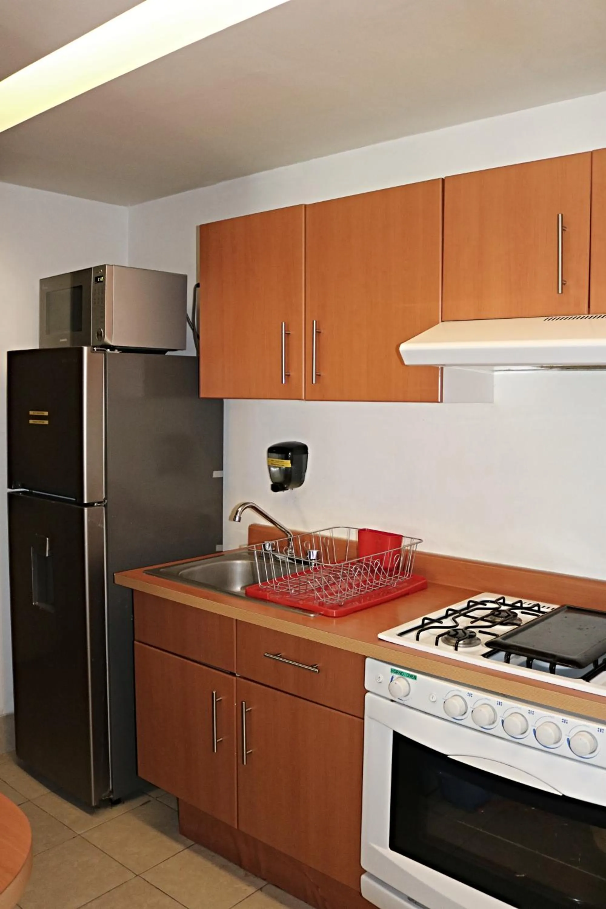 Kitchen or kitchenette in Puerta Alameda Suites México