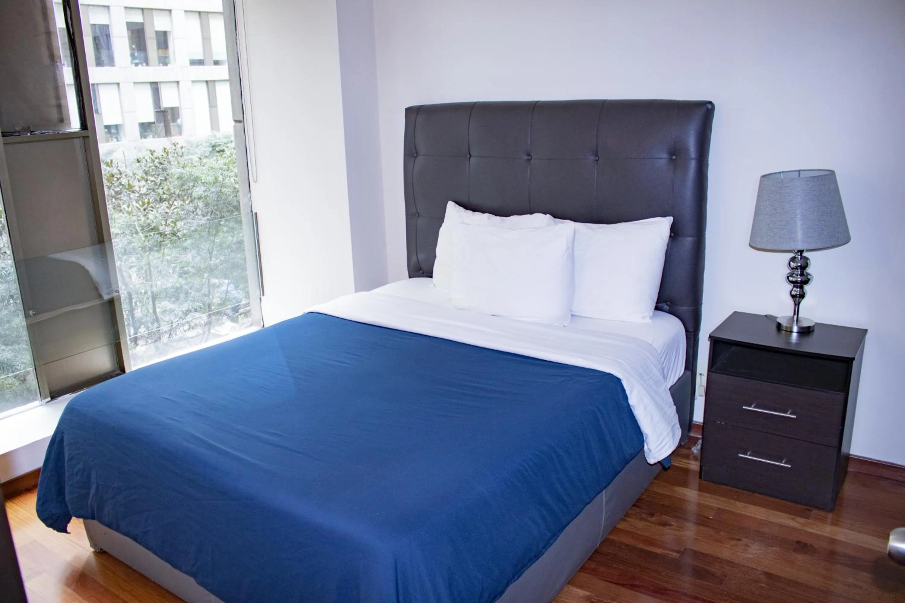 Bed in Puerta Alameda Suites México