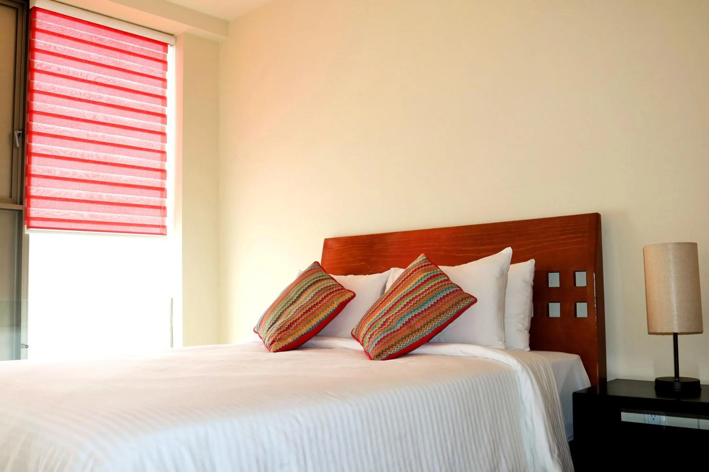 Bed in Puerta Alameda Suites México