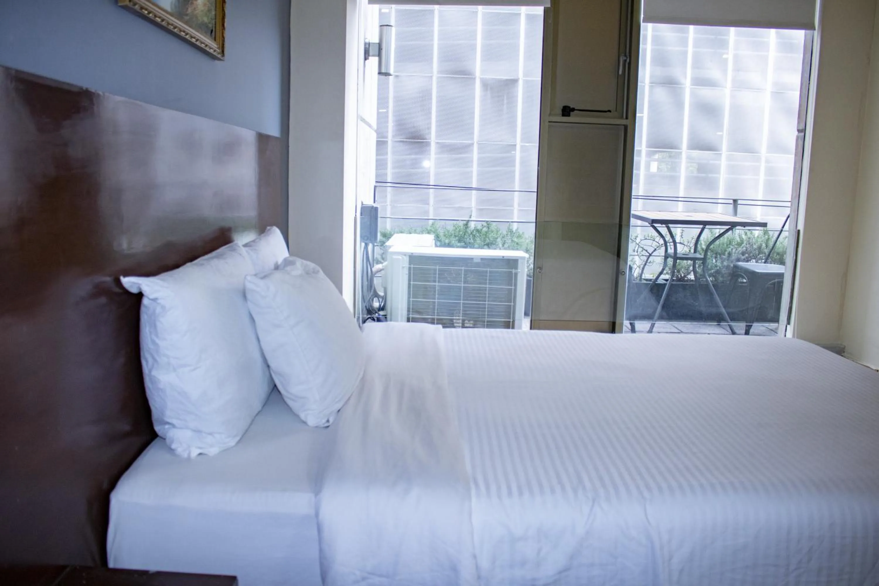 Bedroom, Bed in Puerta Alameda Suites México