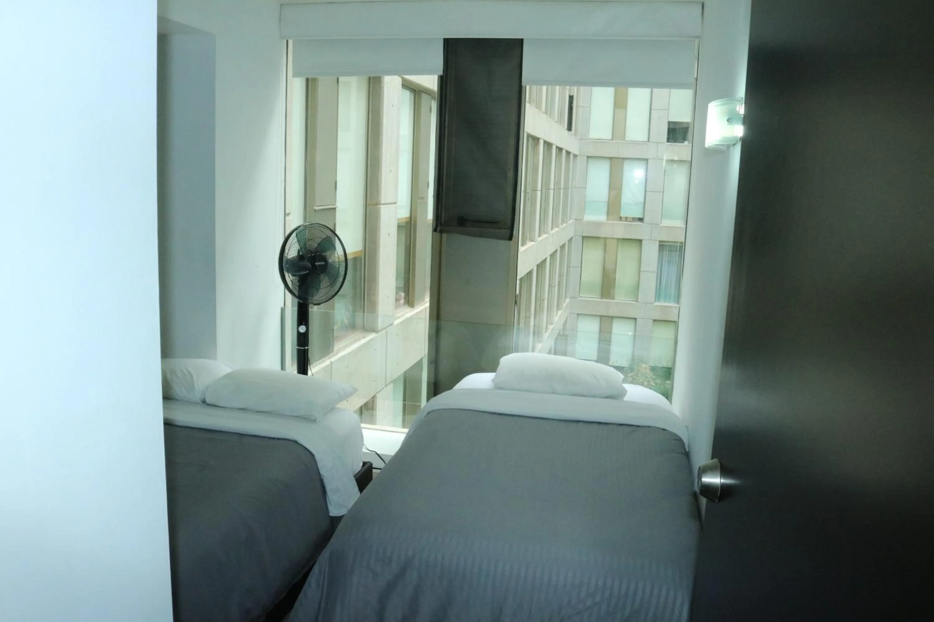 Bed in Puerta Alameda Suites México