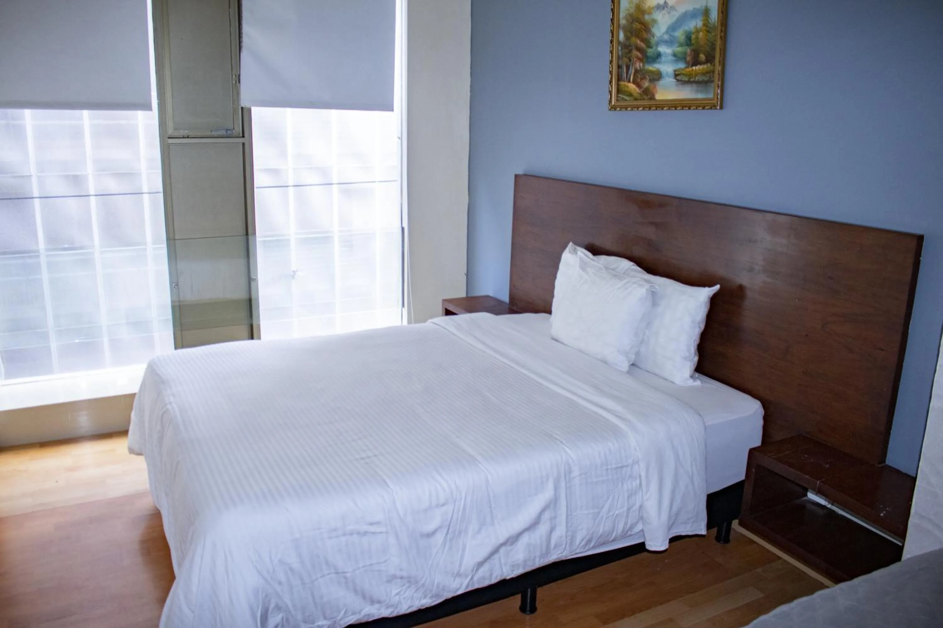 Bed in Puerta Alameda Suites México