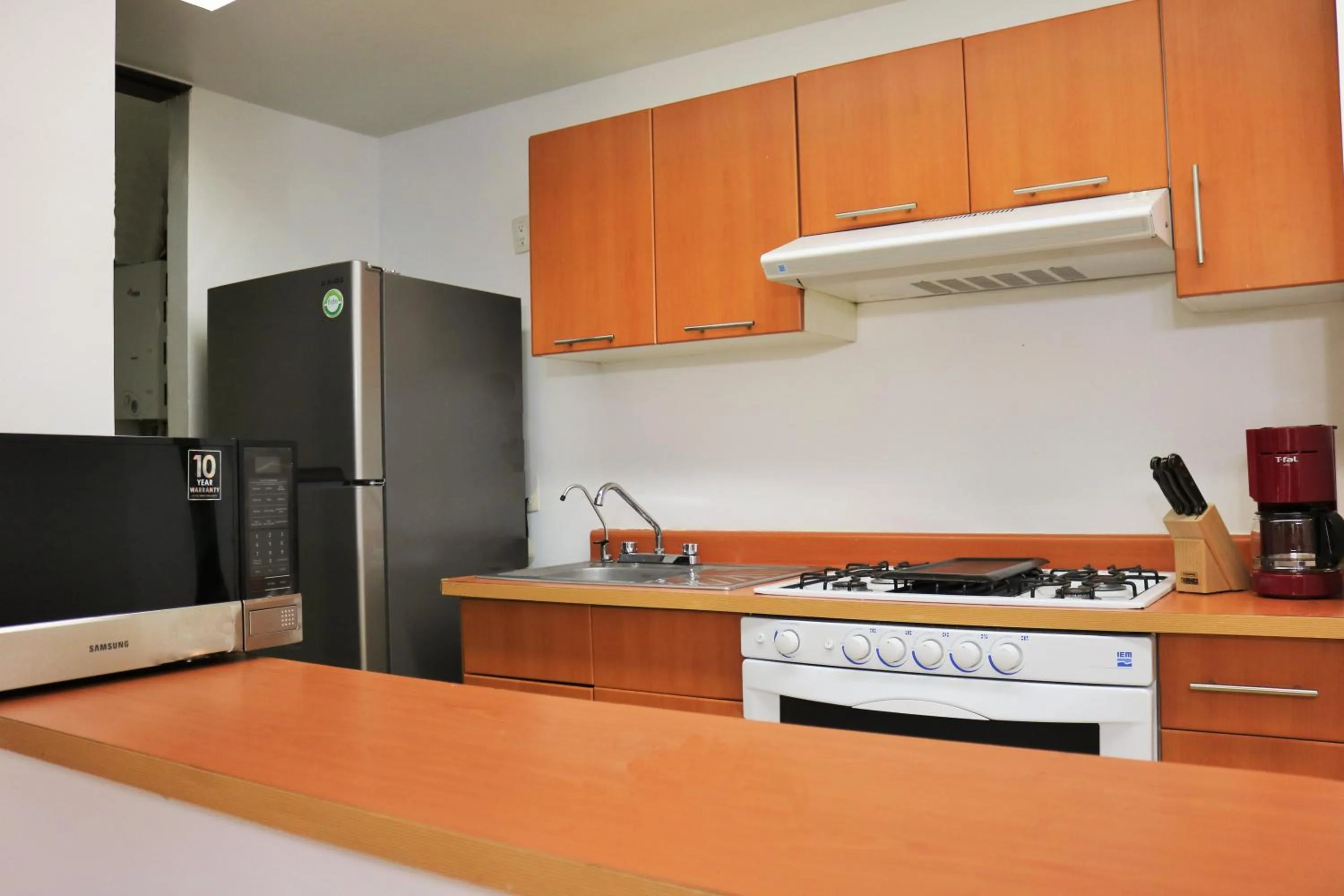 Kitchen or kitchenette in Puerta Alameda Suites México