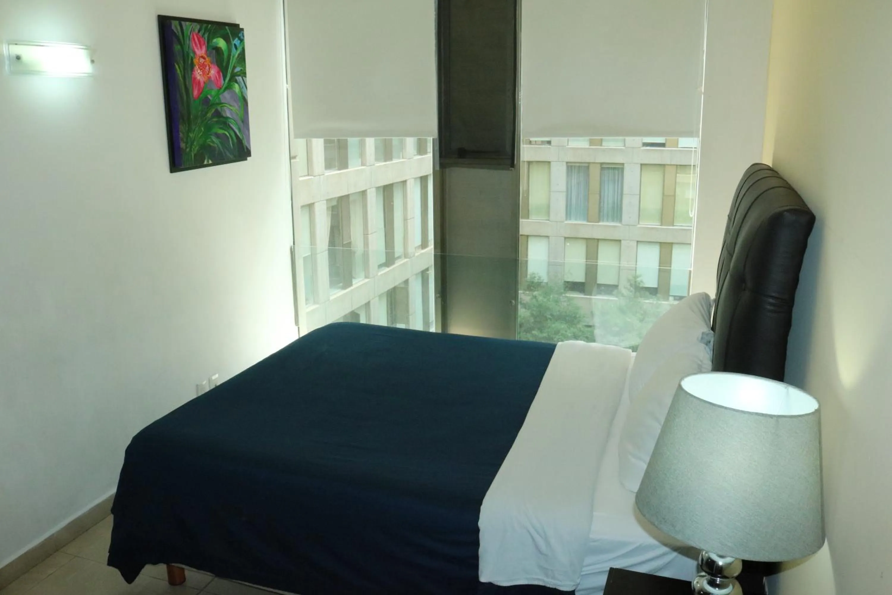 Bed in Puerta Alameda Suites México