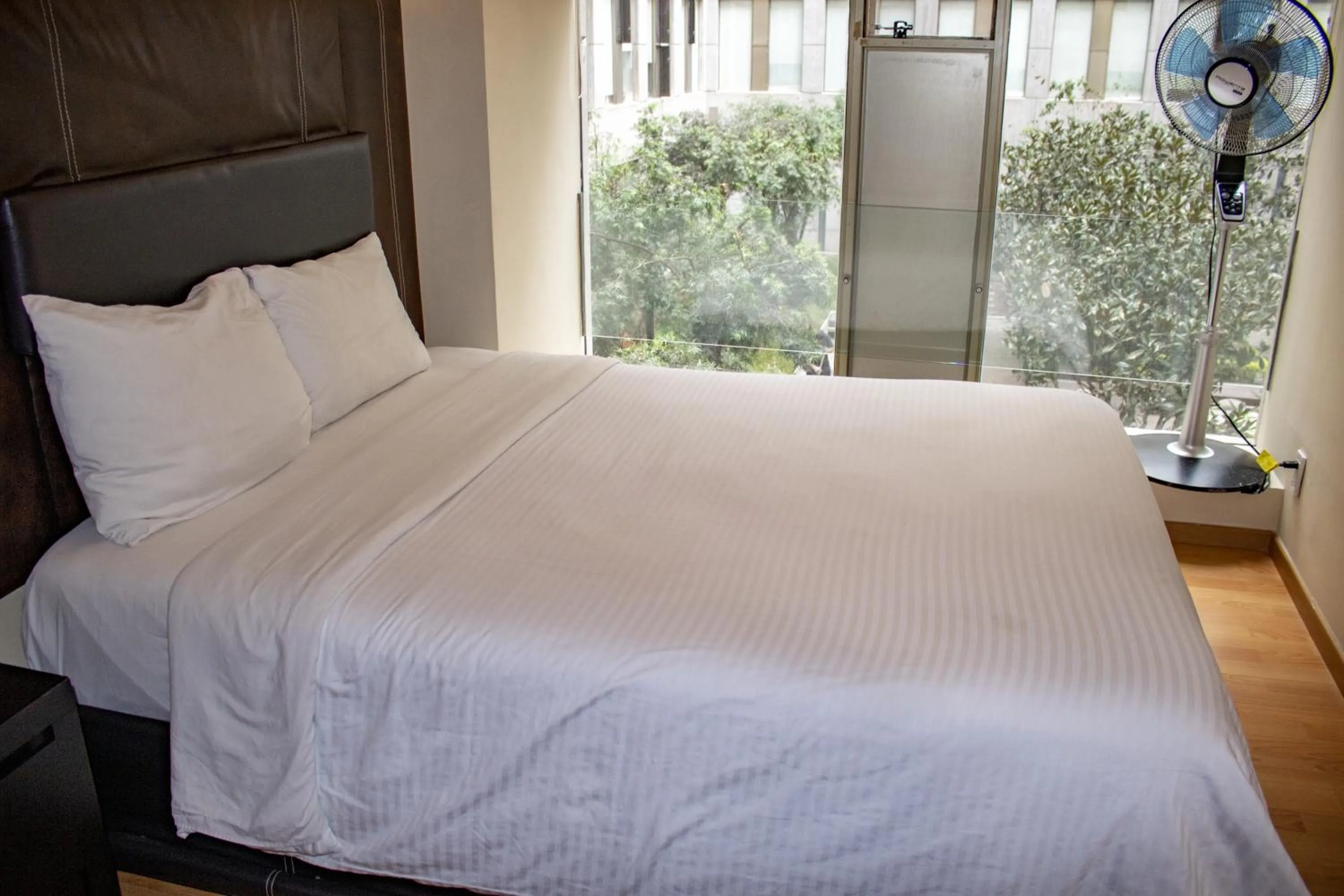 Bed in Puerta Alameda Suites México