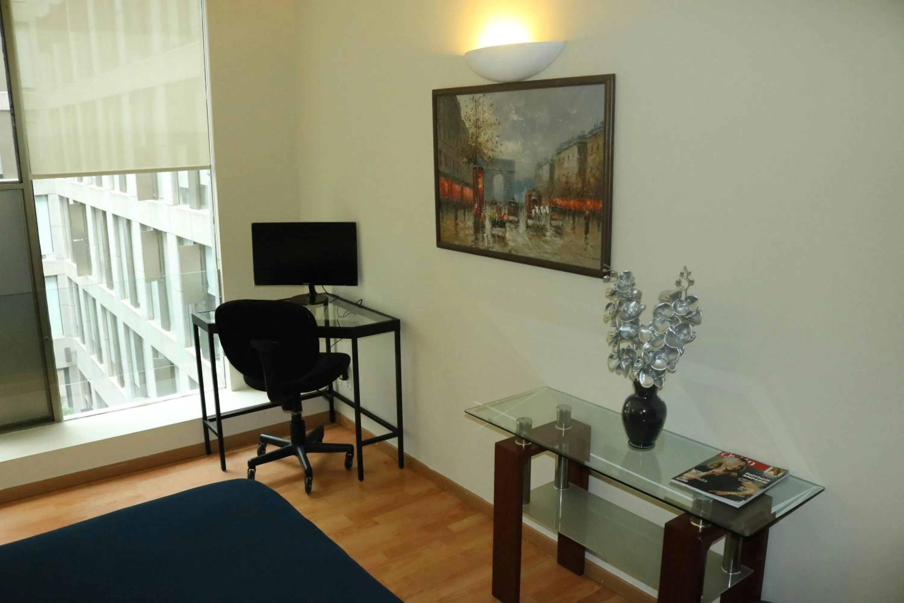 Seating area in Puerta Alameda Suites México