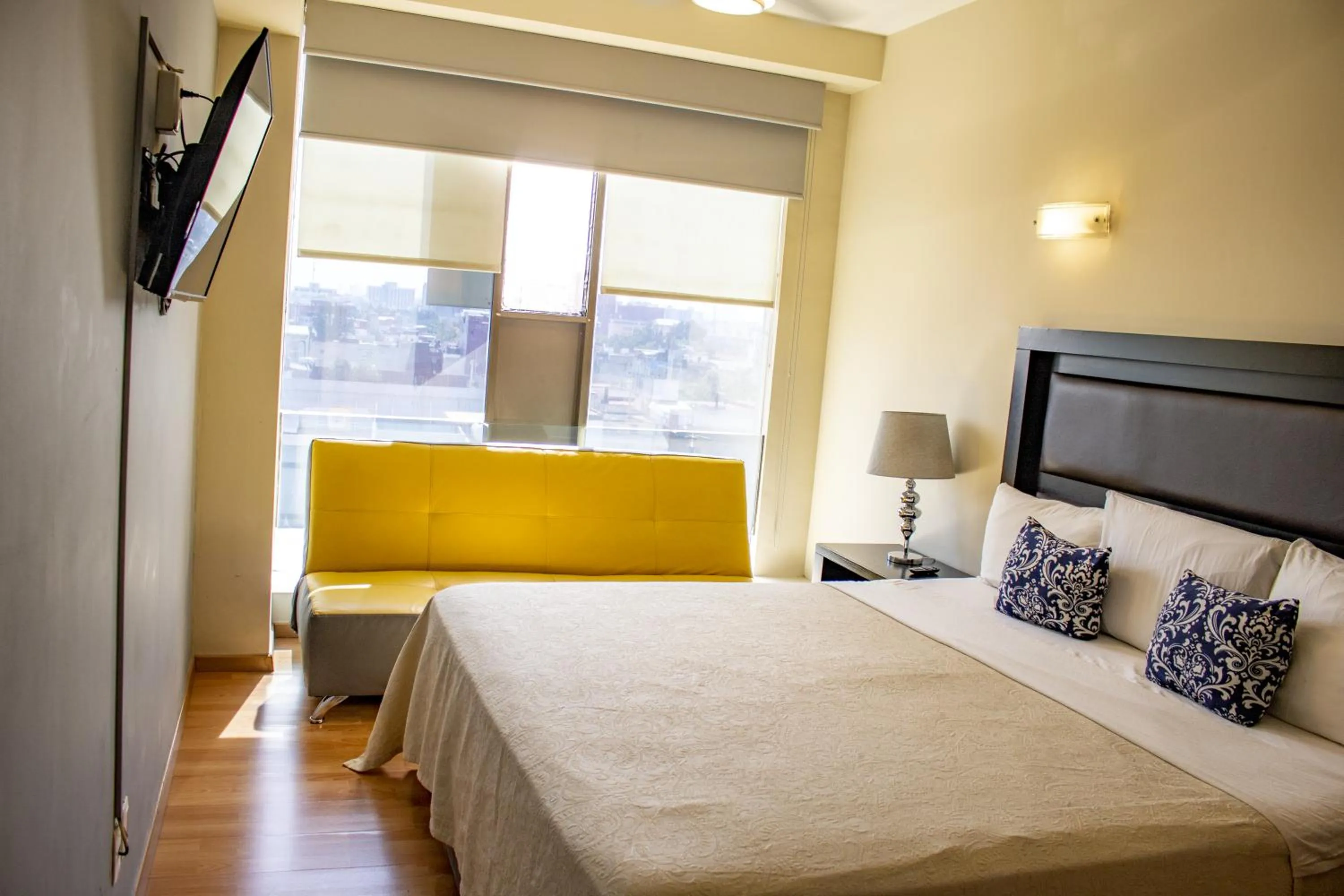 Bed in Puerta Alameda Suites México