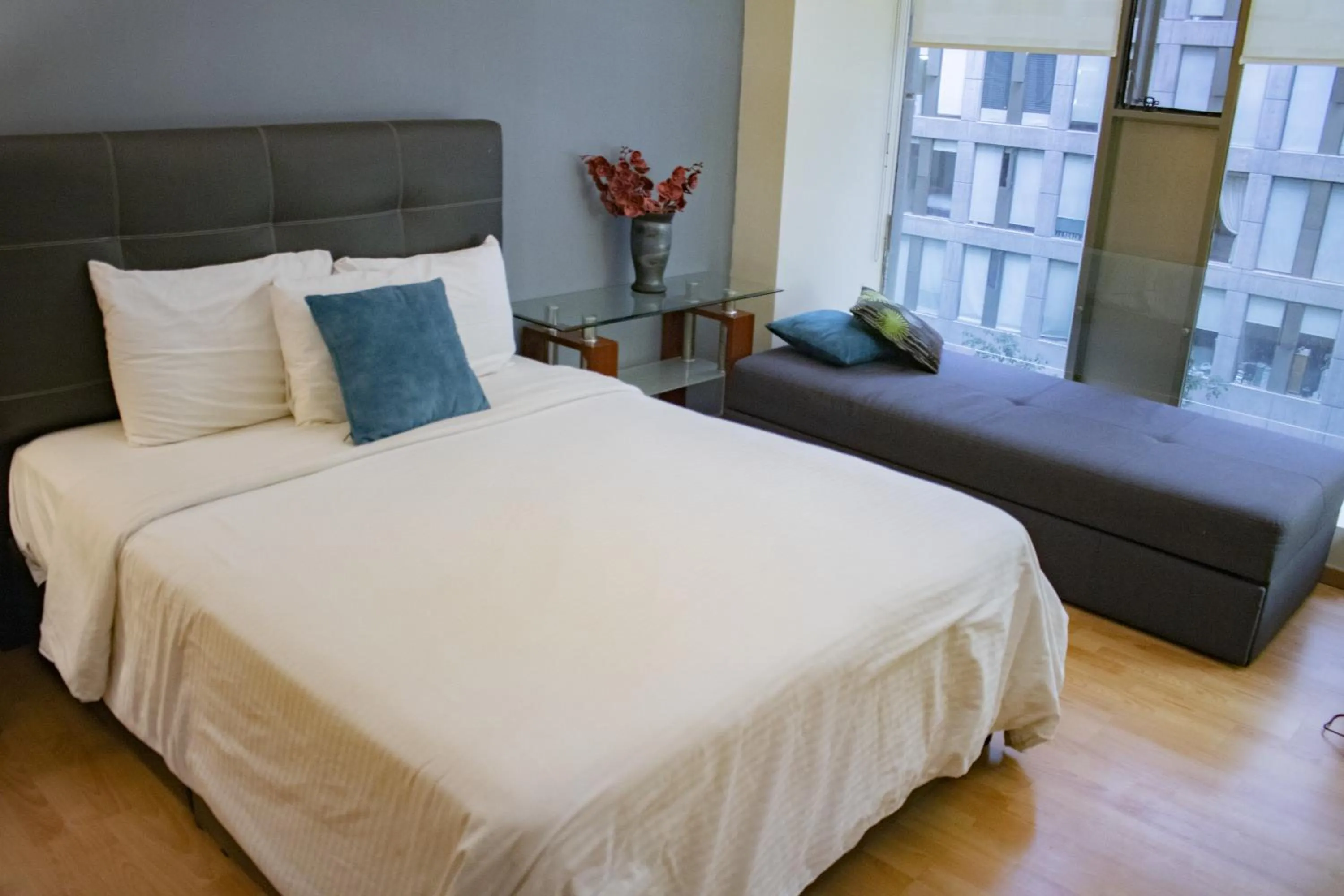 Bed in Puerta Alameda Suites México