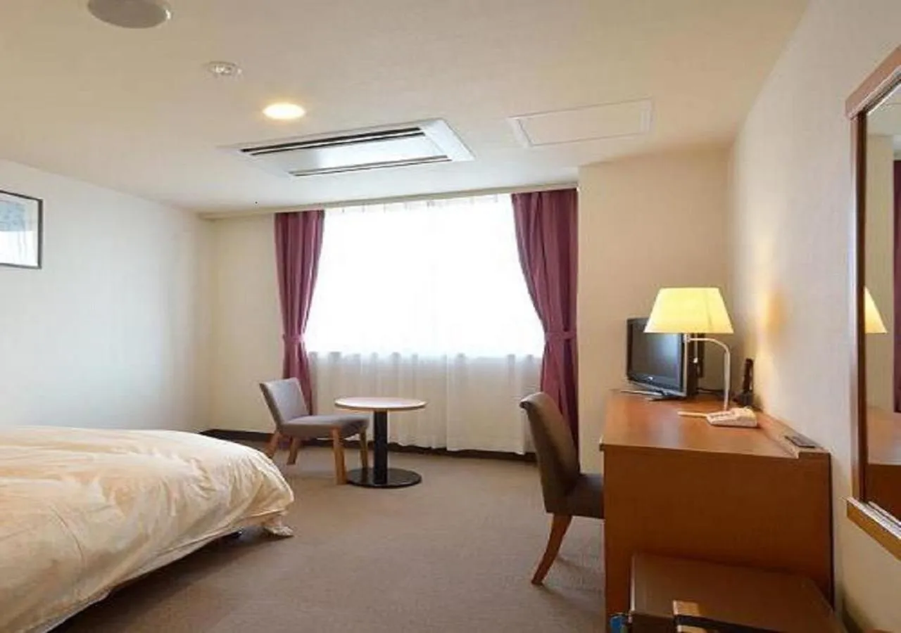 Photo of the whole room, Bed in Daini Prince Hotel Muroran View