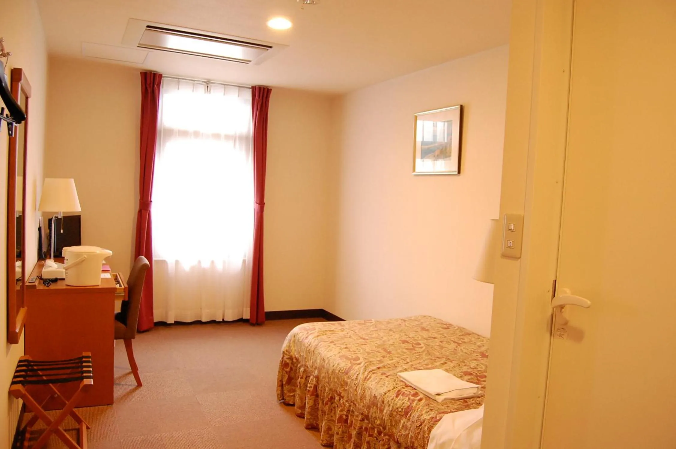 Bed in Daini Prince Hotel Muroran View