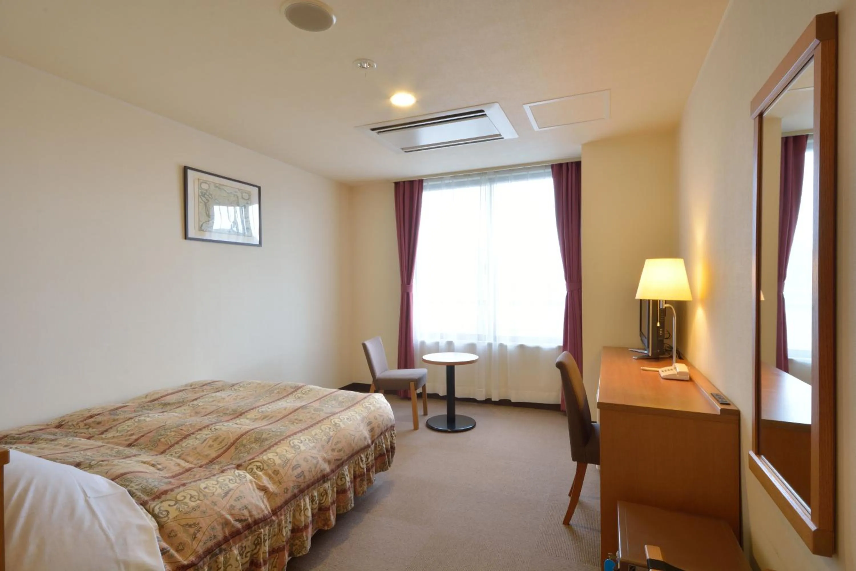 Bed in Daini Prince Hotel Muroran View