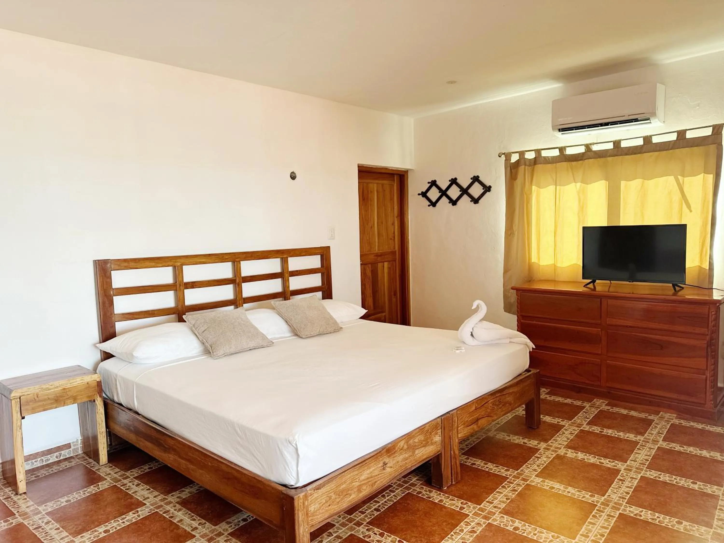 Bed in Hotel El Perico Marinero