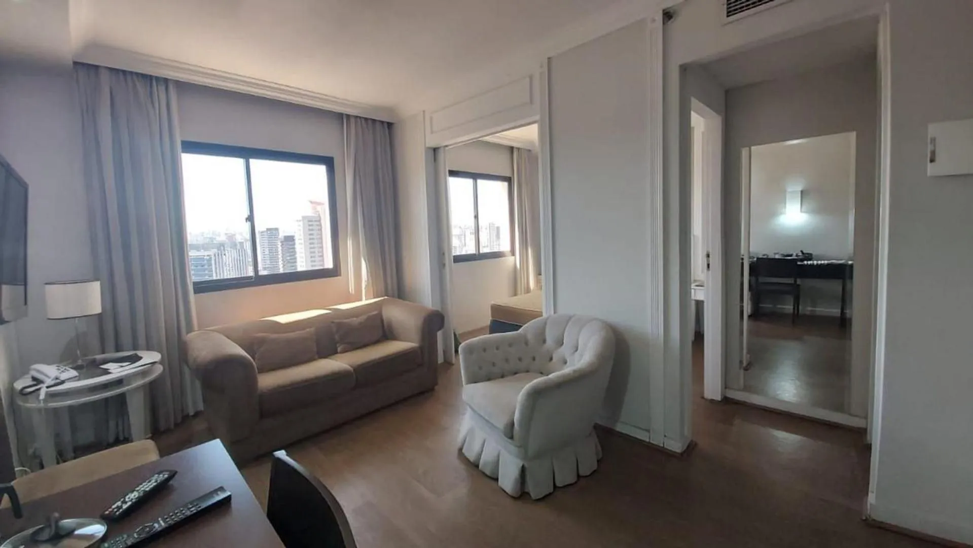 Living room, Bed in Charmoso Flat na Vila Oimpia