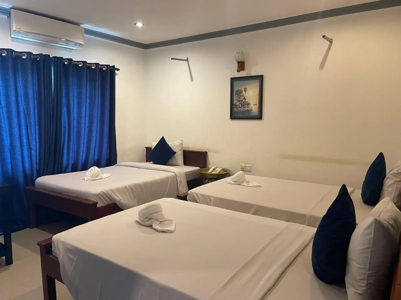 Bed in Parent Heritage Angkor Villa