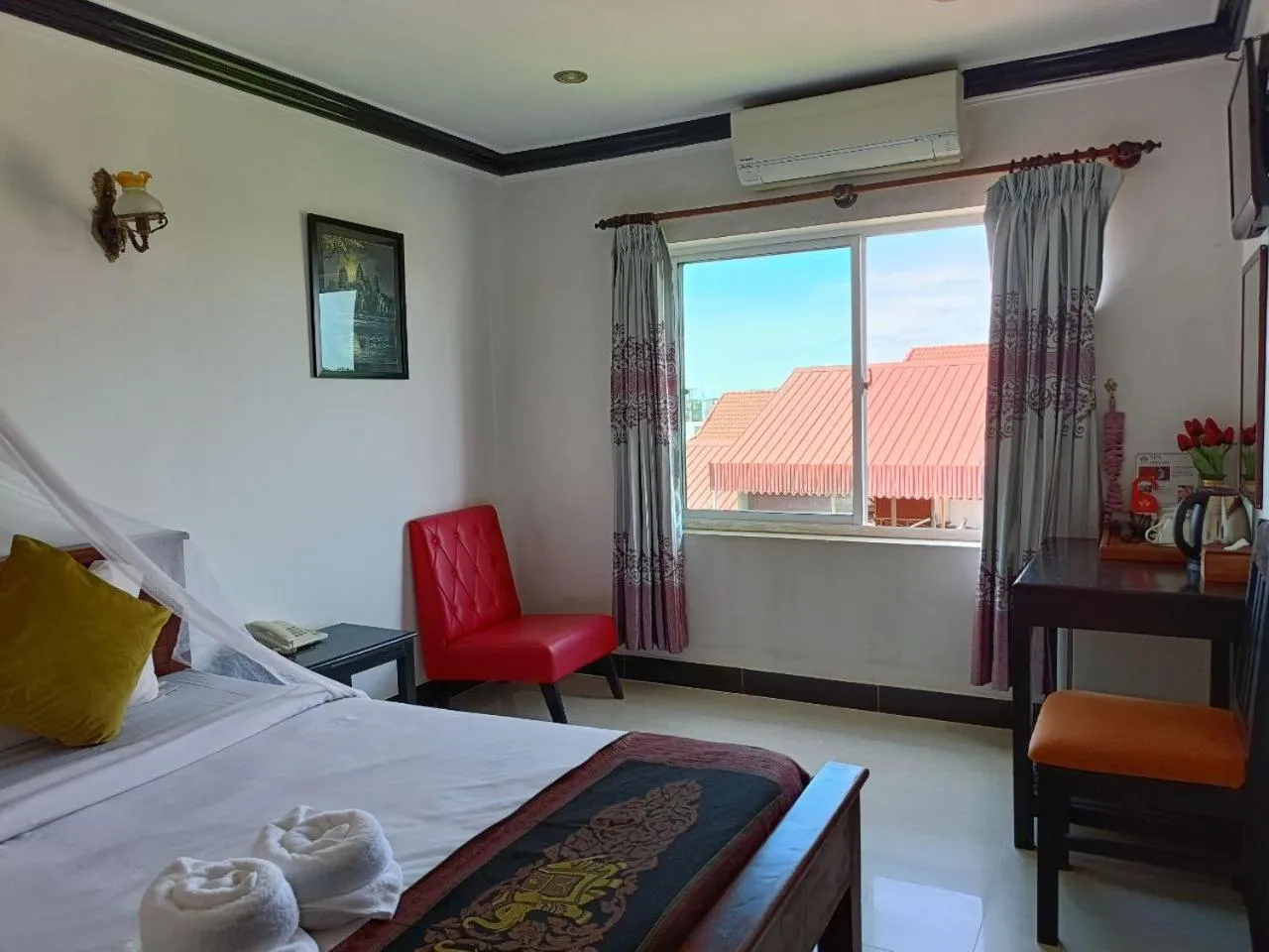 Bed in Parent Heritage Angkor Villa