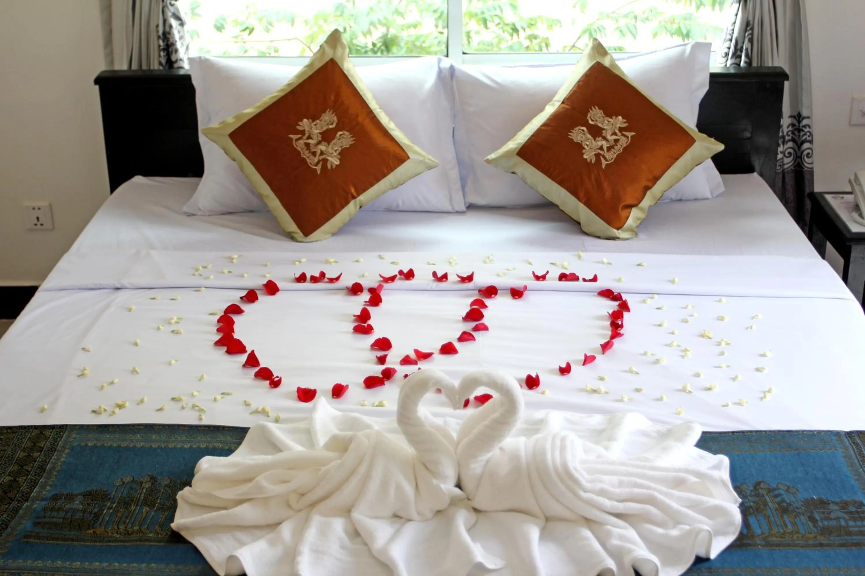 Bed in Parent Heritage Angkor Villa