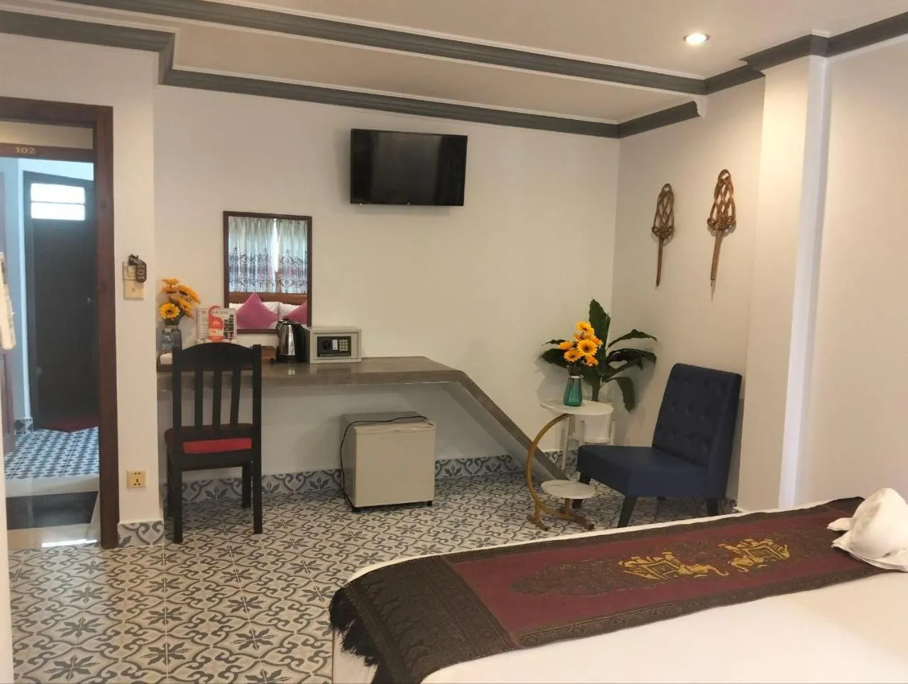 Bed in Parent Heritage Angkor Villa