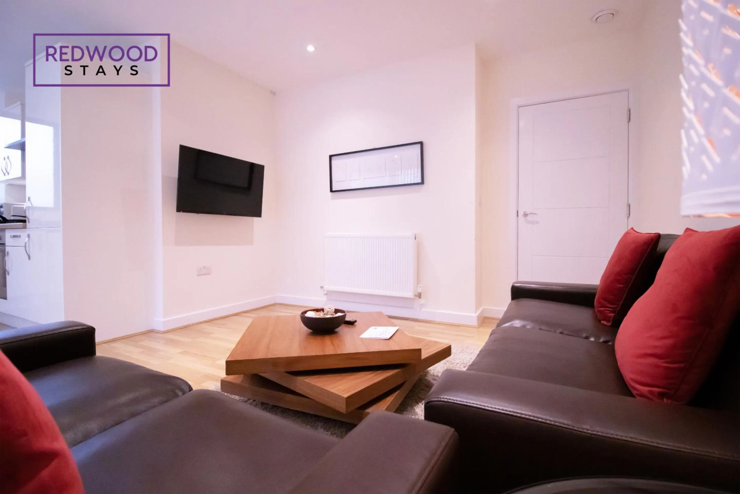 Living room in Festival Place, Modern Town Center Apartment, Perfect for Contractors & Families, FREE Parking & WiFi by REDWOOD STAYS