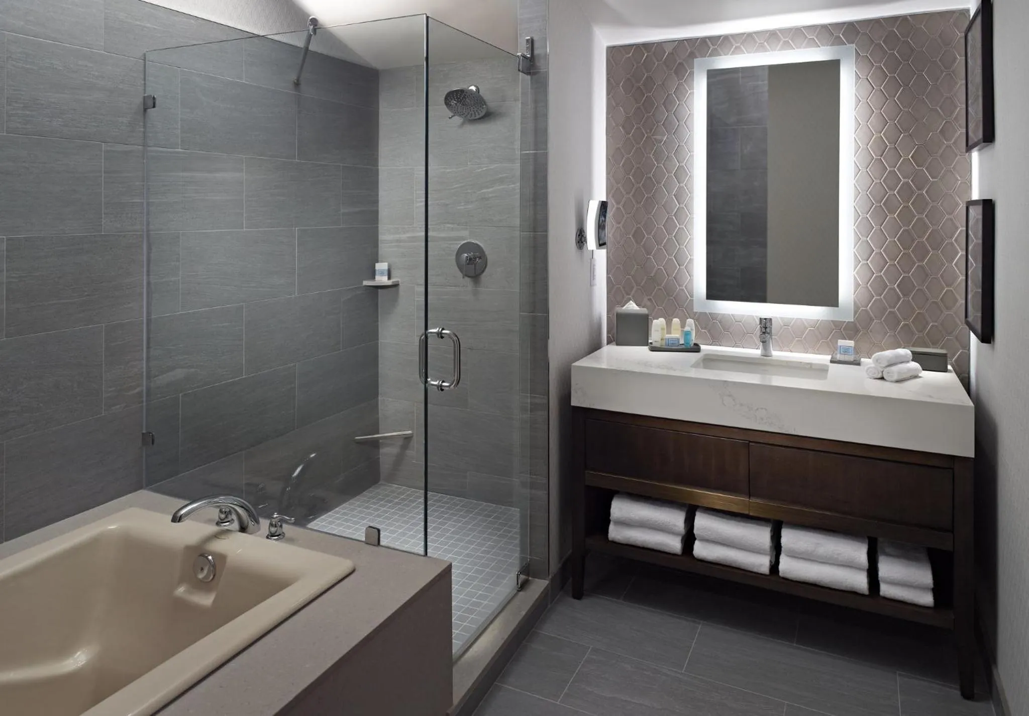 Bathroom, Bed in Omni Charlotte Hotel