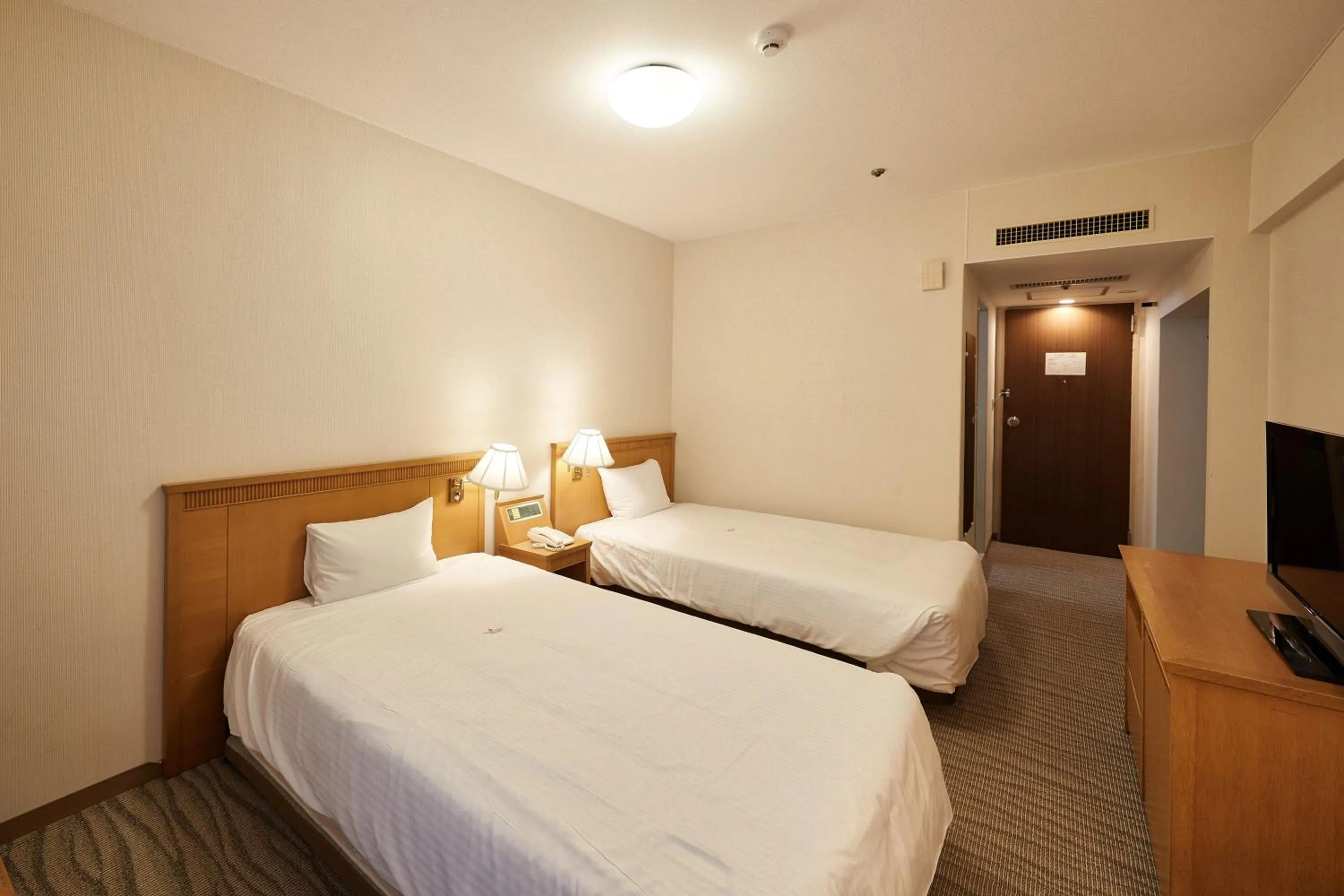 Photo of the whole room, Bed in Pacific Hotel Okinawa