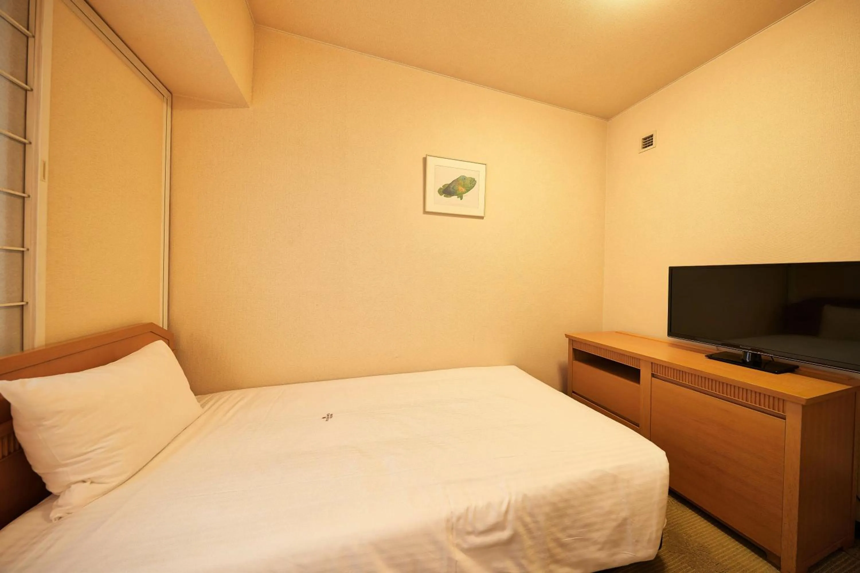 Photo of the whole room, Bed in Pacific Hotel Okinawa