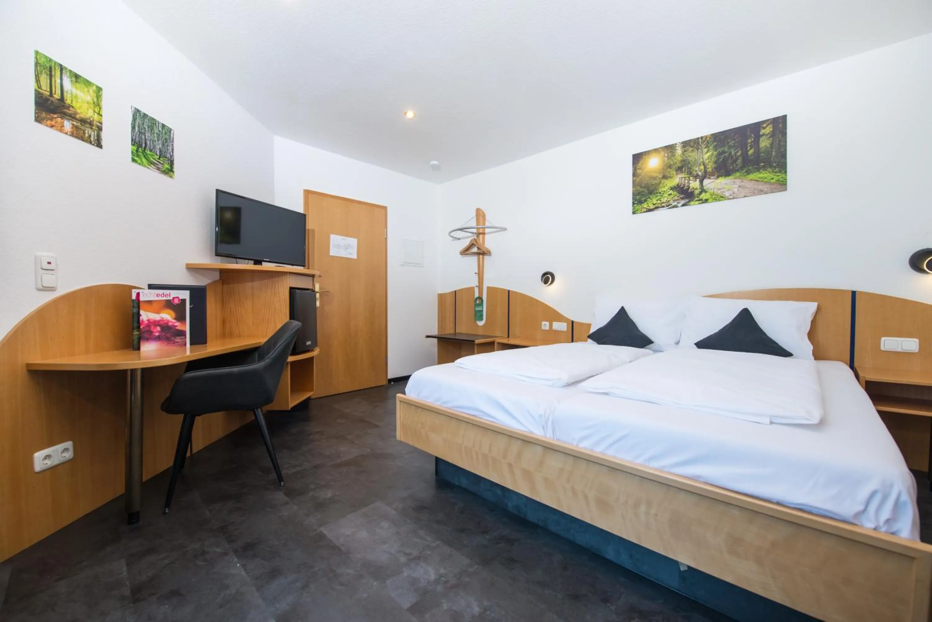 Photo of the whole room, Bed in Berghotel Kristall