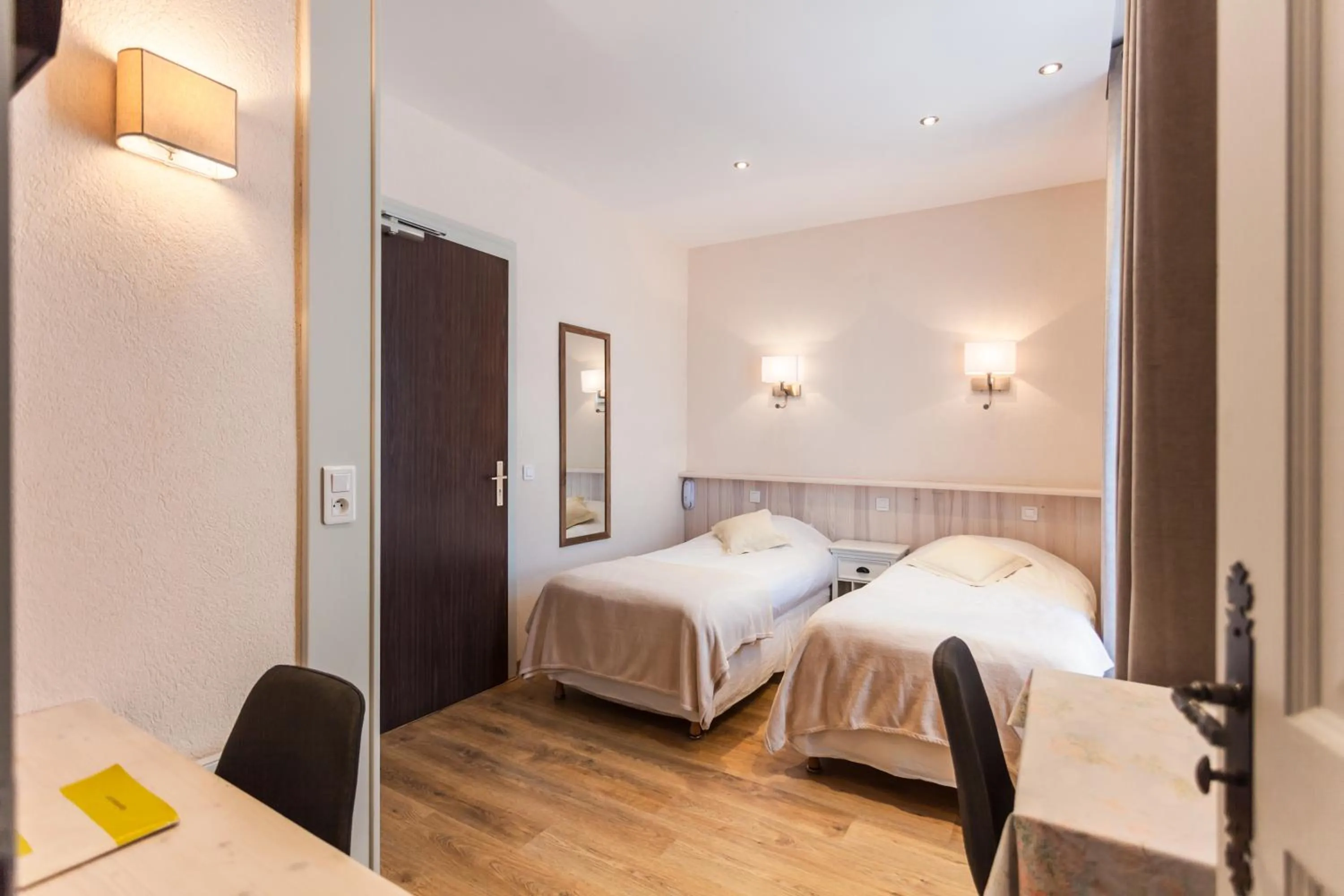 Bed in Hôtel De La Plage