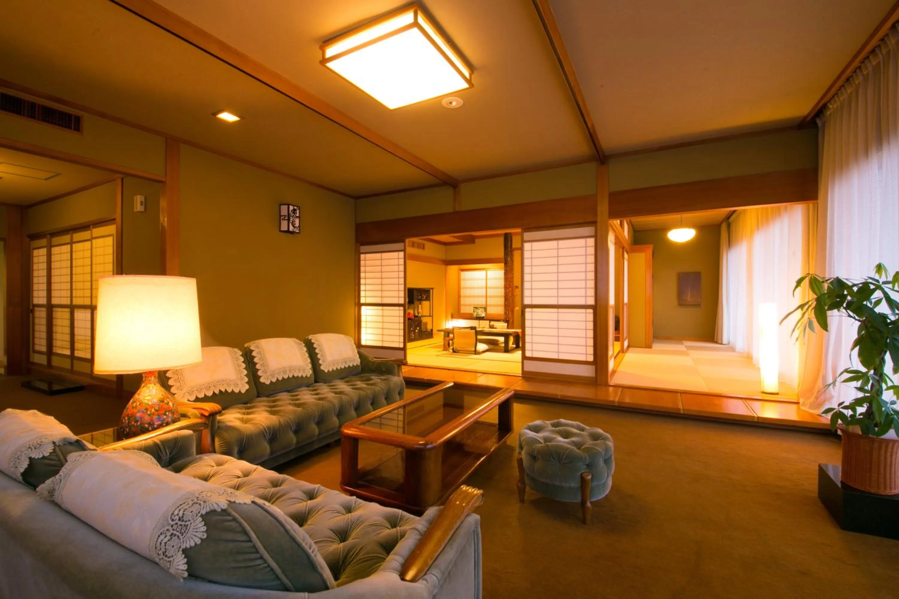 Living room, Bed in Ibusuki Syusui-en