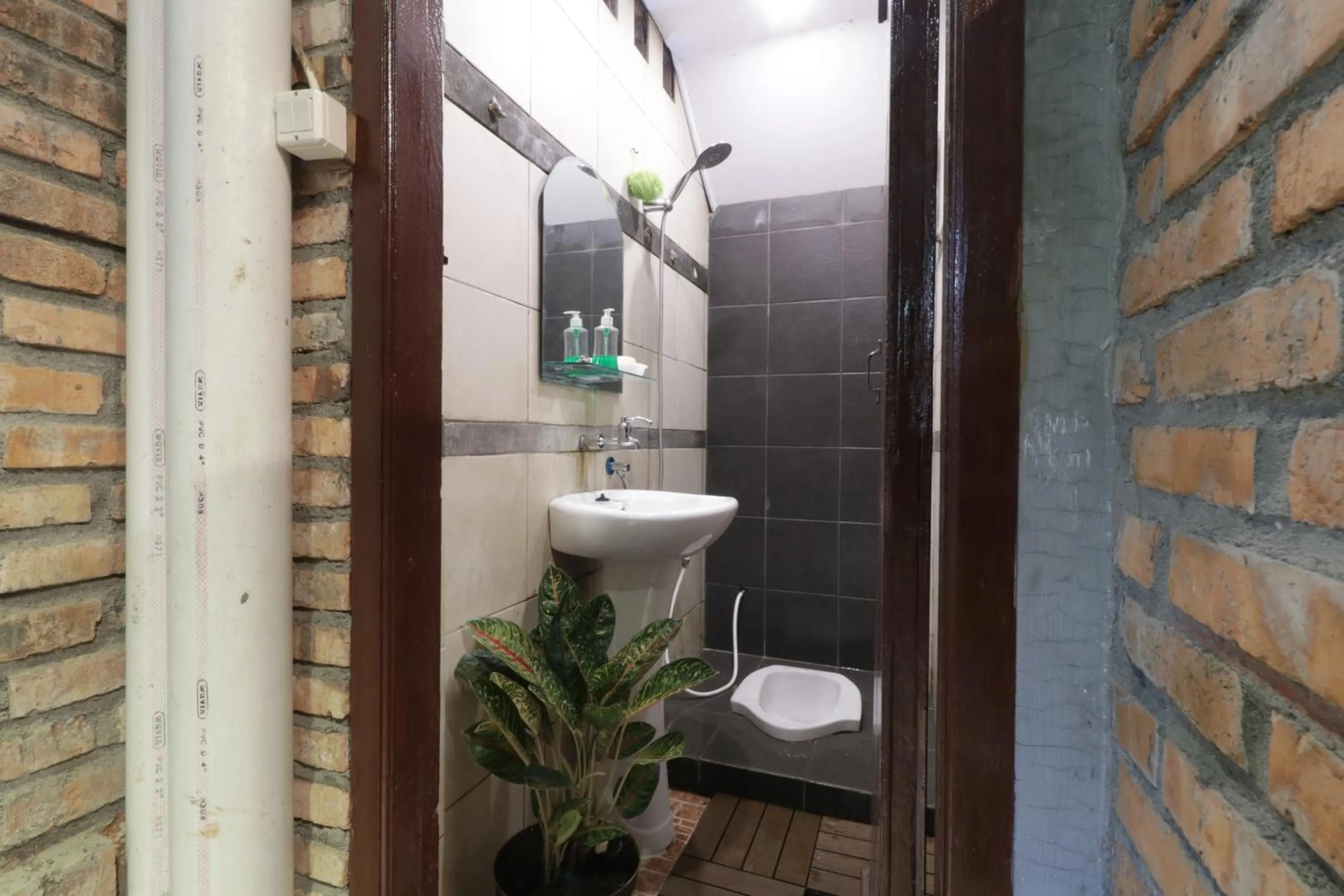 Bathroom in NILA HOUSE, Sharia Family Home Stay