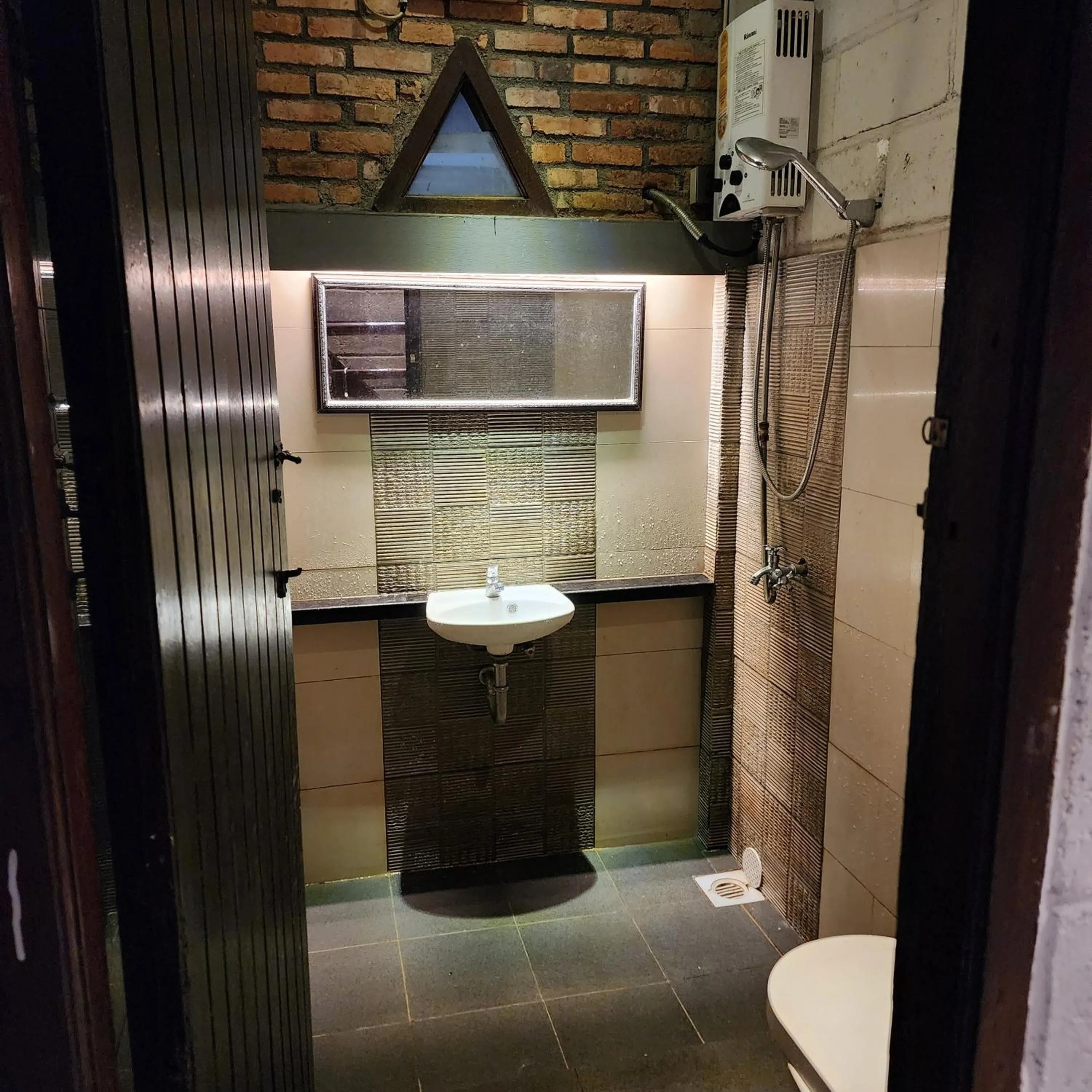 Bathroom in NILA HOUSE, Sharia Family Home Stay