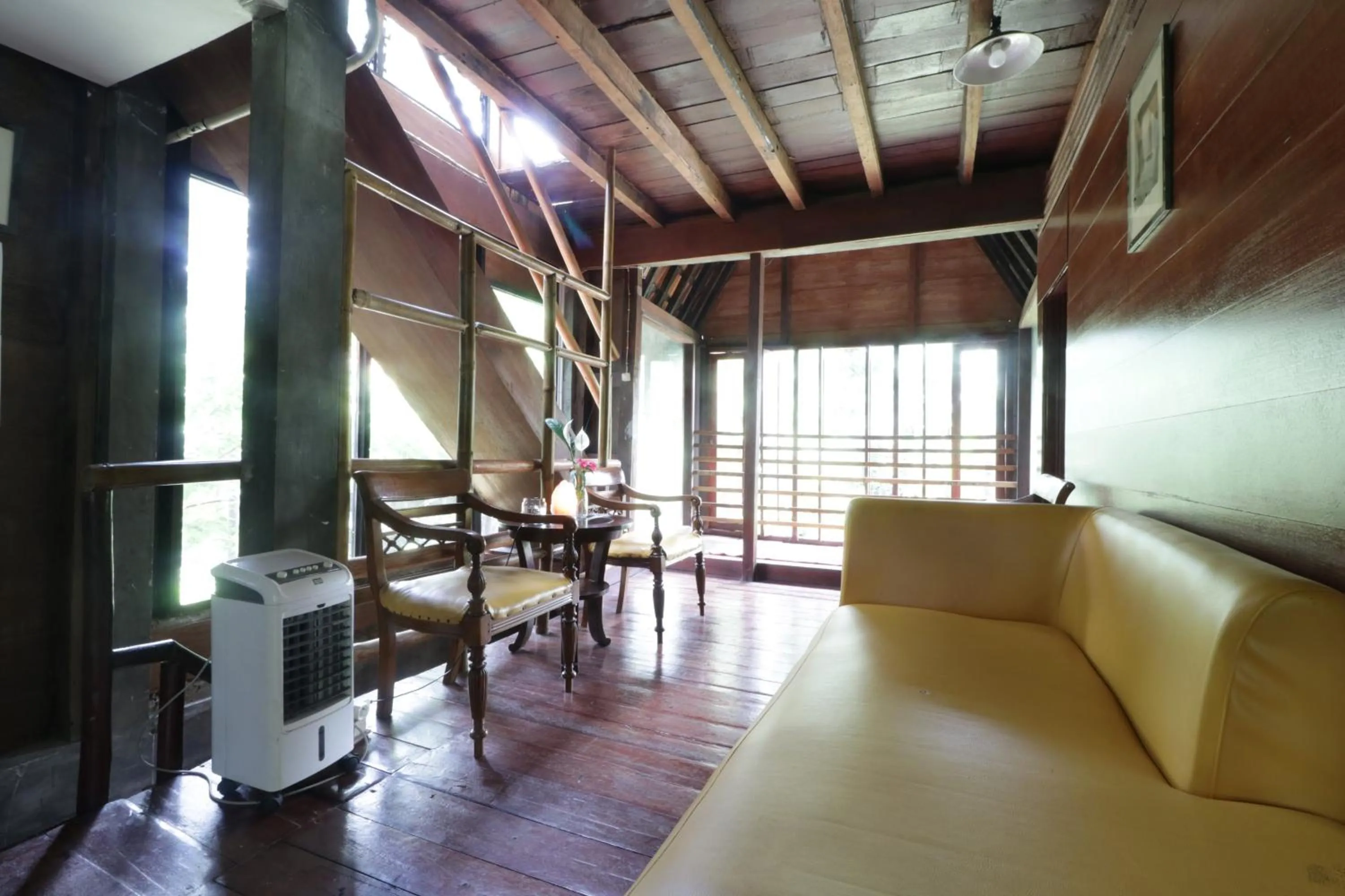 Seating area in NILA HOUSE, Sharia Family Home Stay