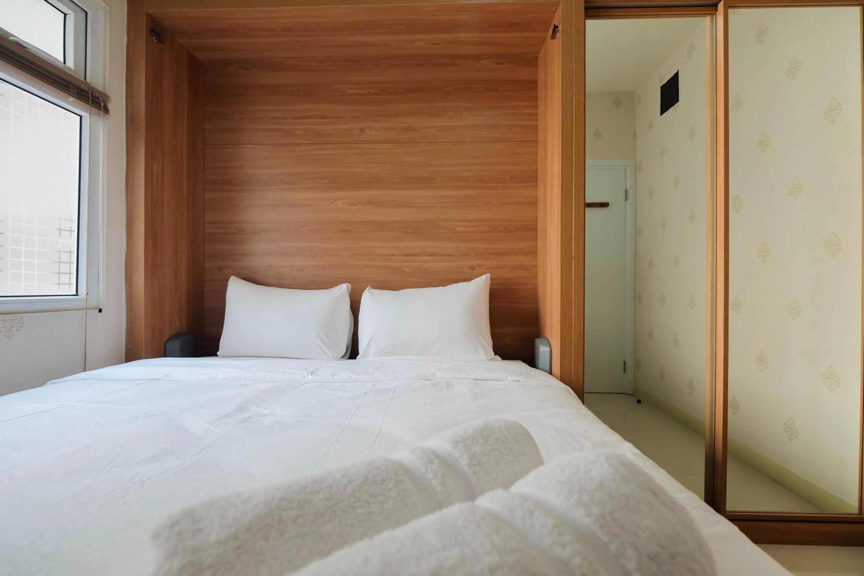 Bedroom, Bed in 2BR Apartment Green Pramuka City near Shopping Mall By Travelio
