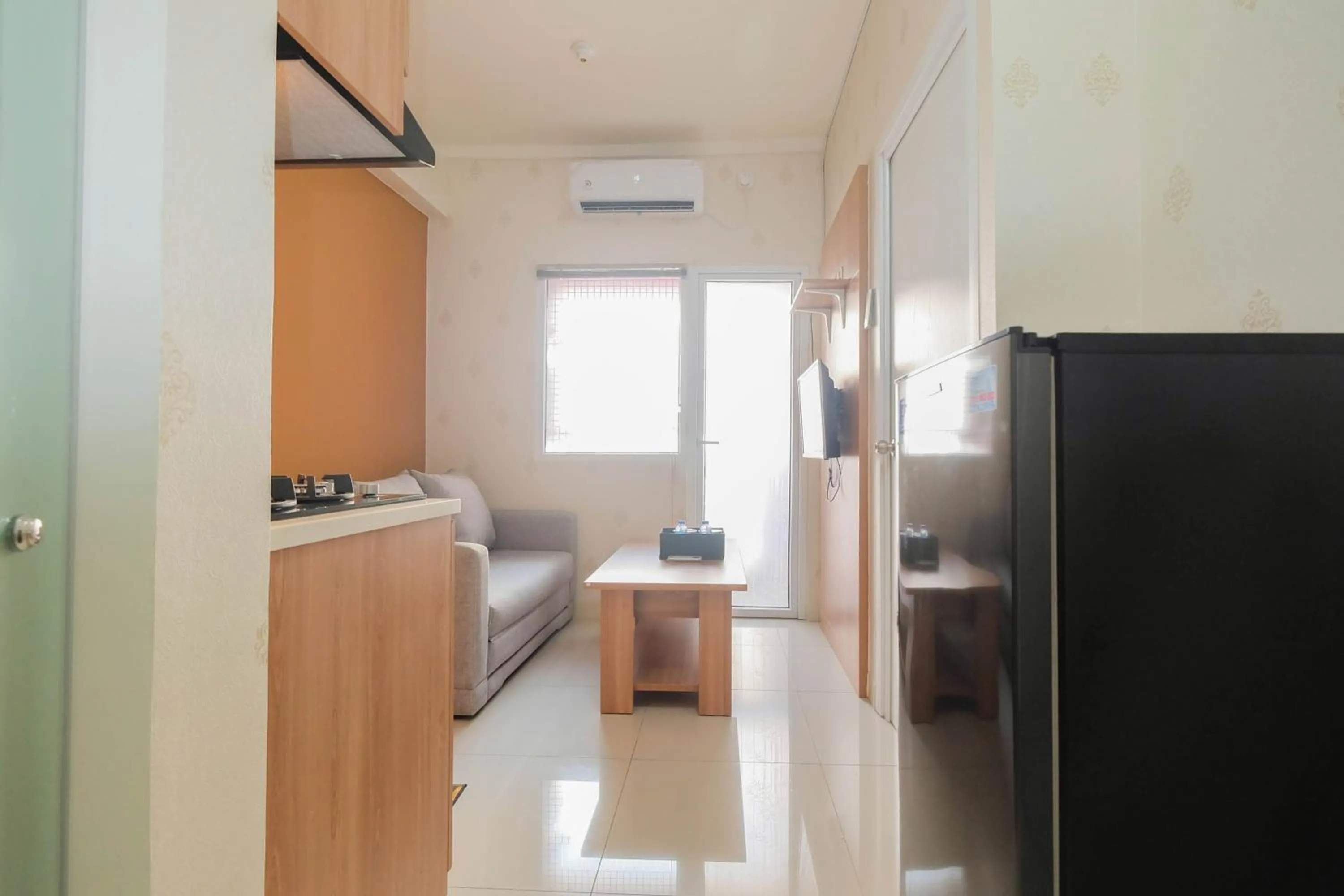 2BR Apartment Green Pramuka City near Shopping Mall By Travelio