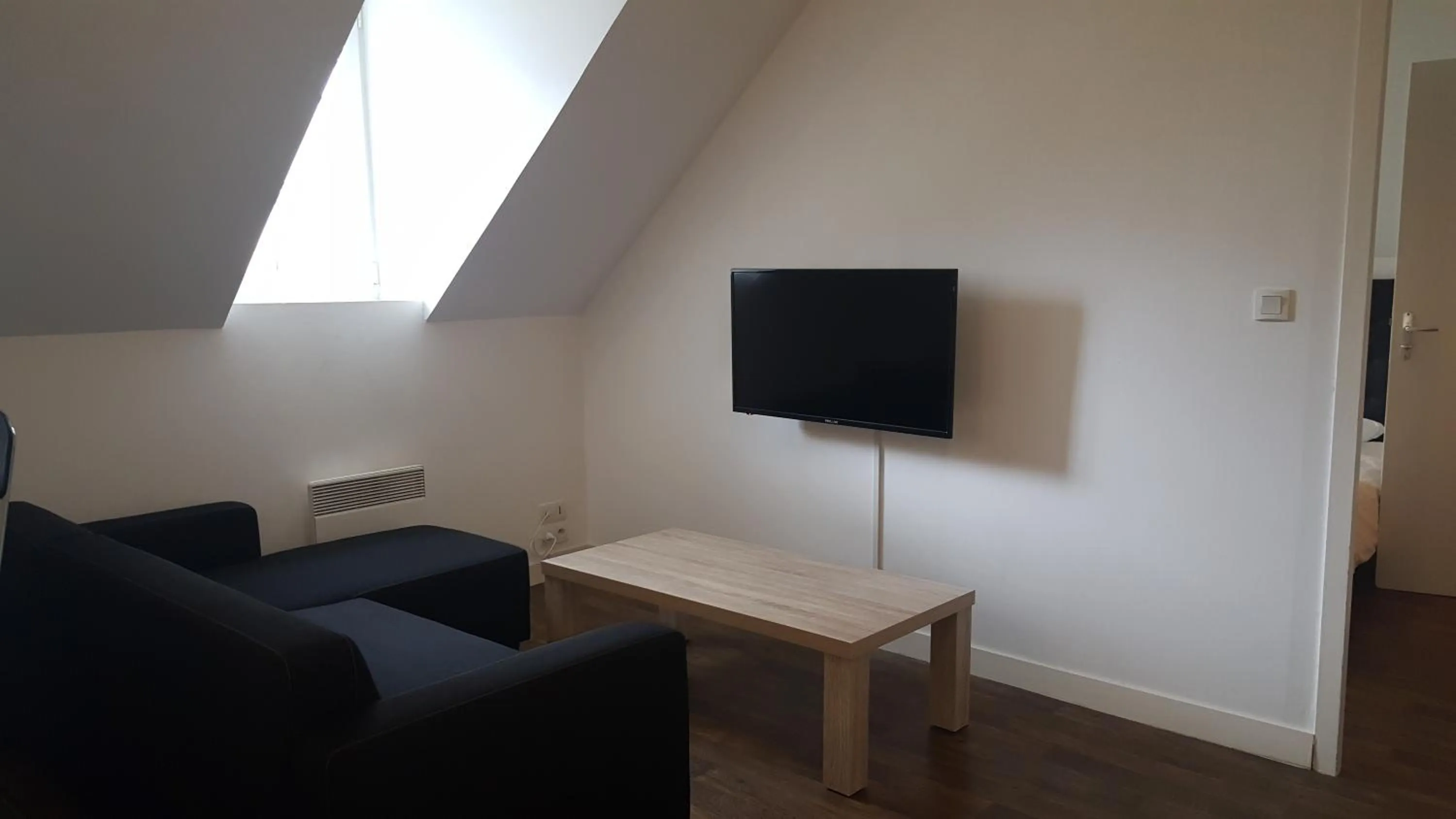 Living room in Au Pigeon Blanc