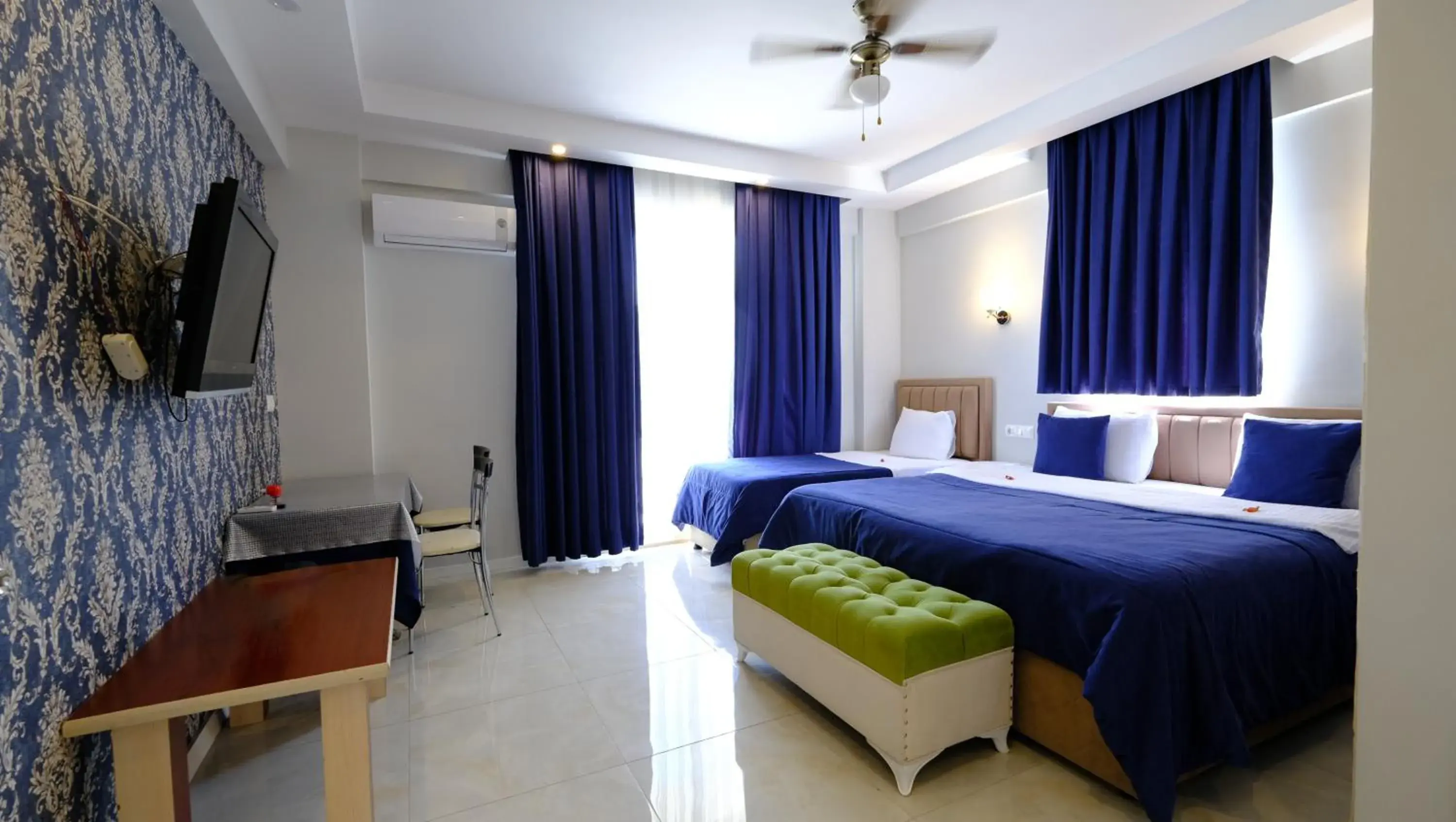 Deluxe Triple Room in The Cotton House Deluxe Triple Room in The Cotton House