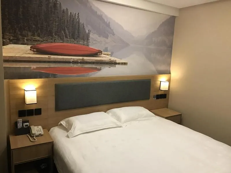 Bed in Thank Inn Plus Hotel Jiangsu Taizhou Gaogang Port Middle School