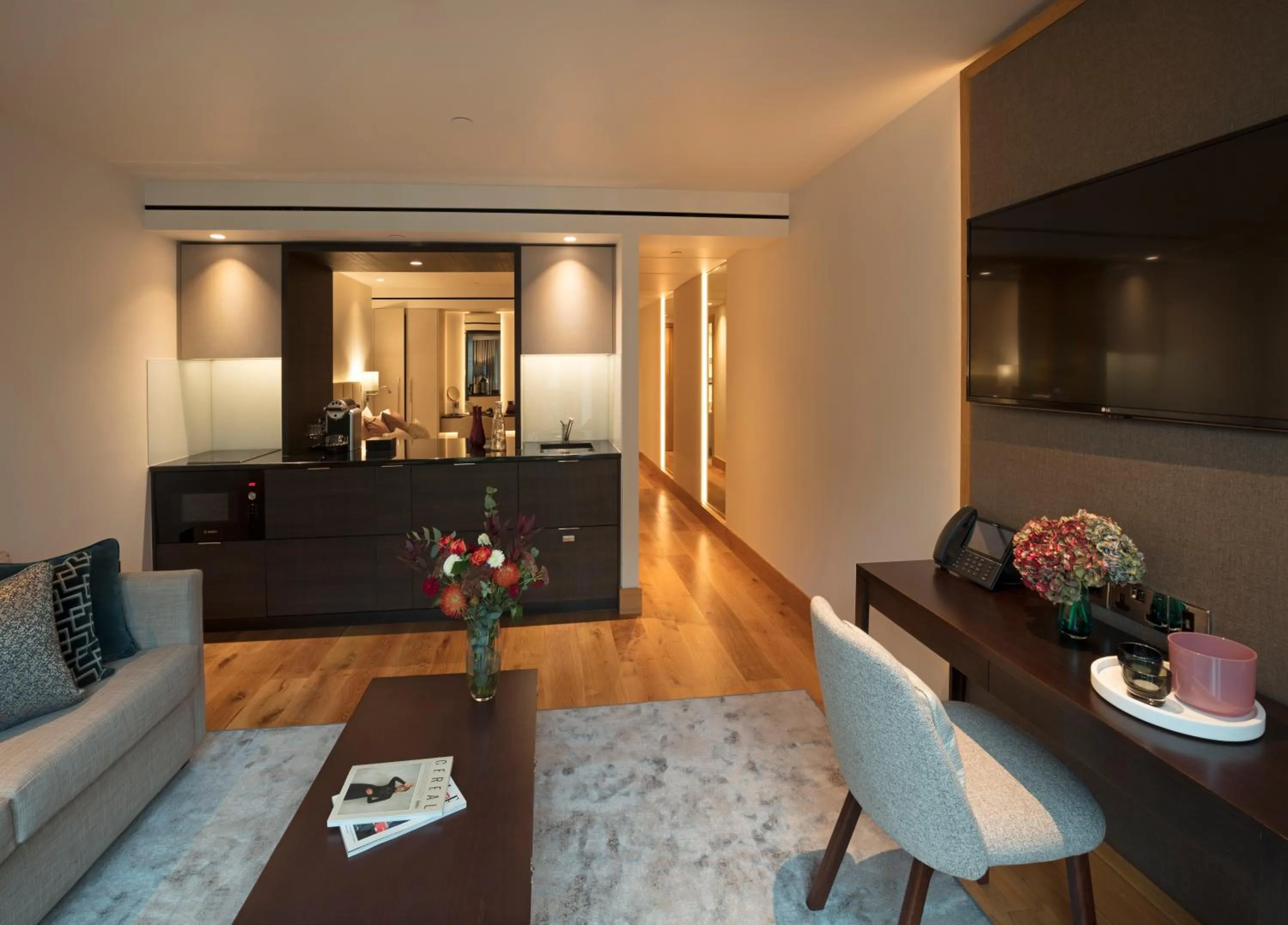 Seating area in Tower Suites by Blue Orchid