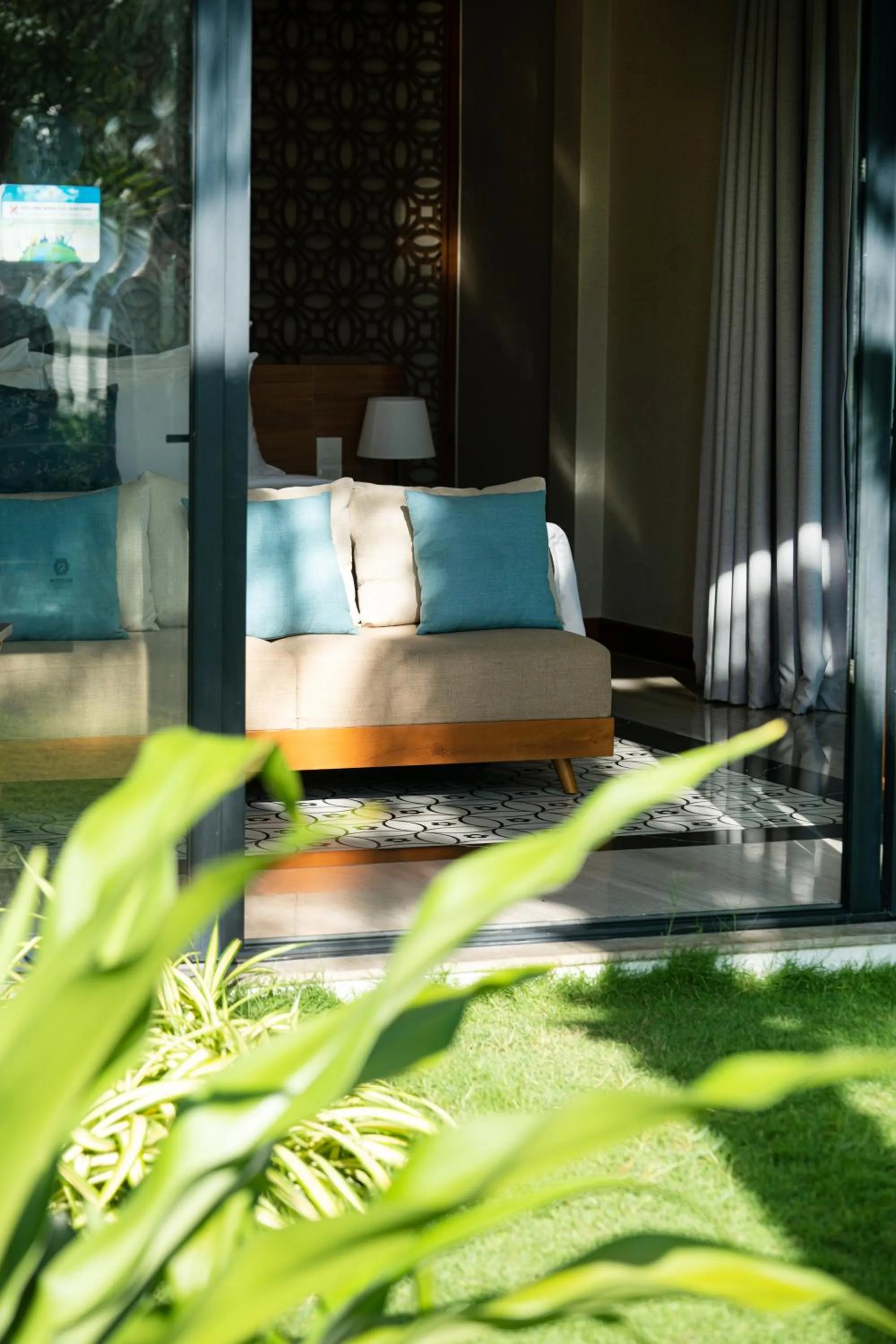 Seating area, Bed in Selectum Noa Resort Cam Ranh