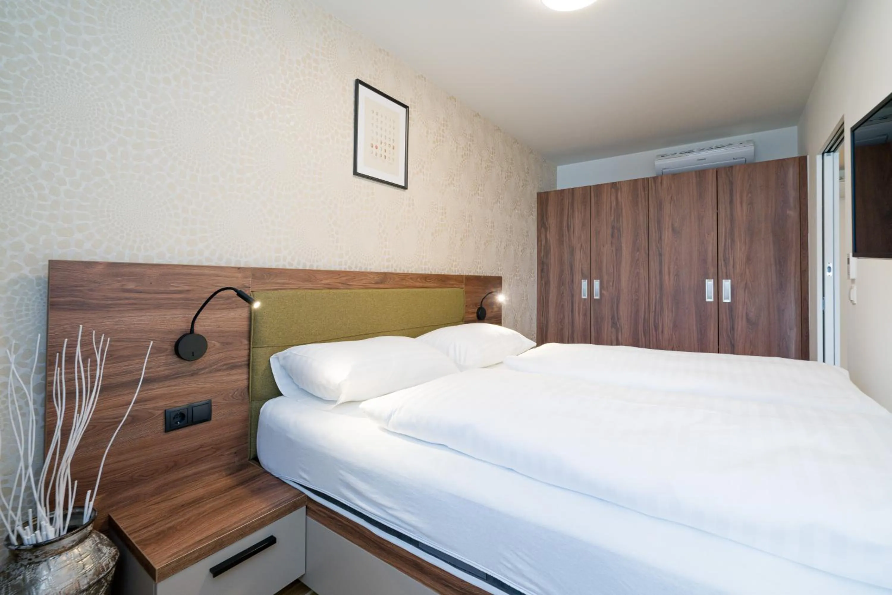 Communal lounge/ TV room, Bed in MyApartments Vienna