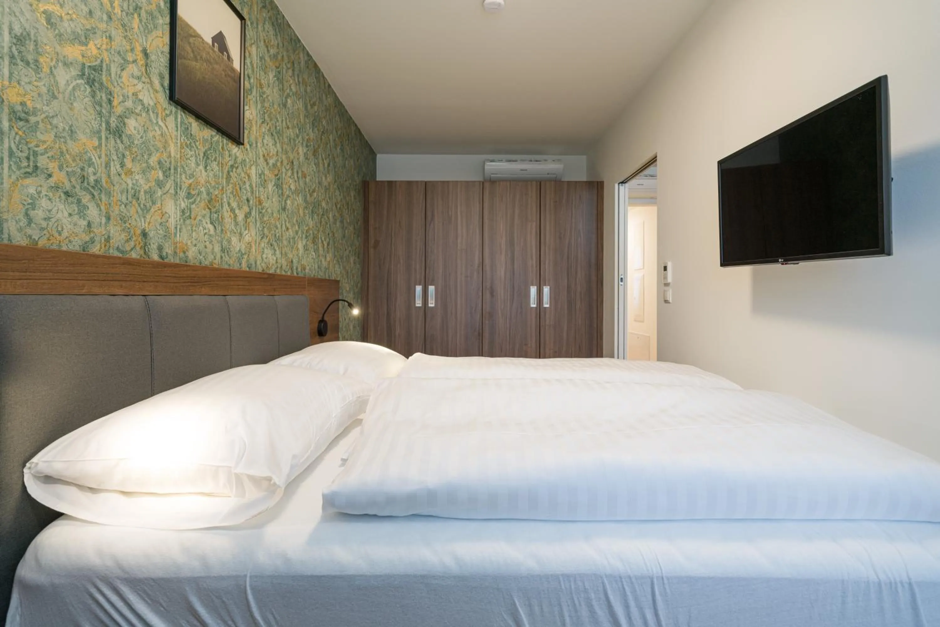 Bed in MyApartments Vienna