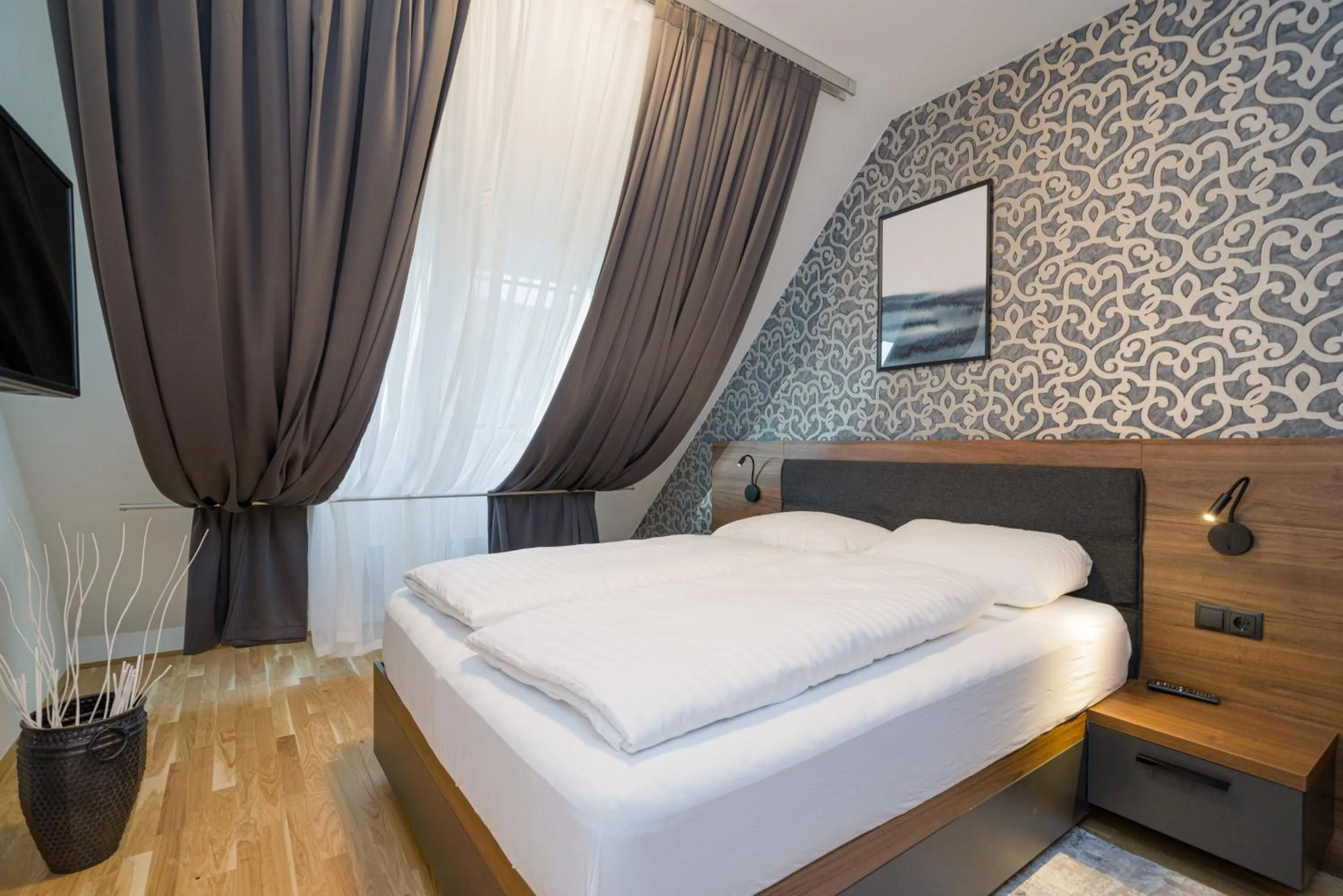 Communal lounge/ TV room, Bed in MyApartments Vienna