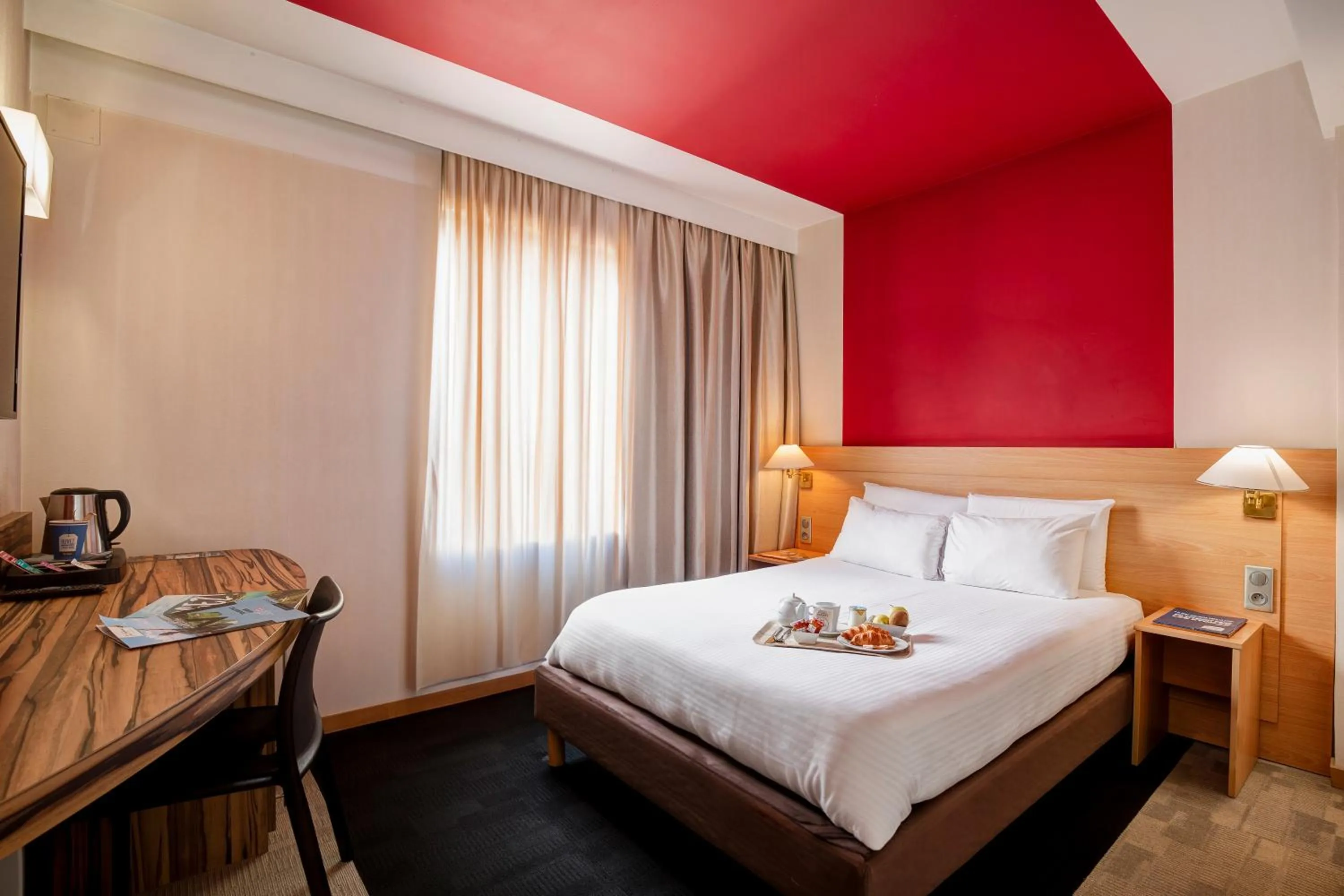 Bed in Kyriad Montbeliard Sochaux