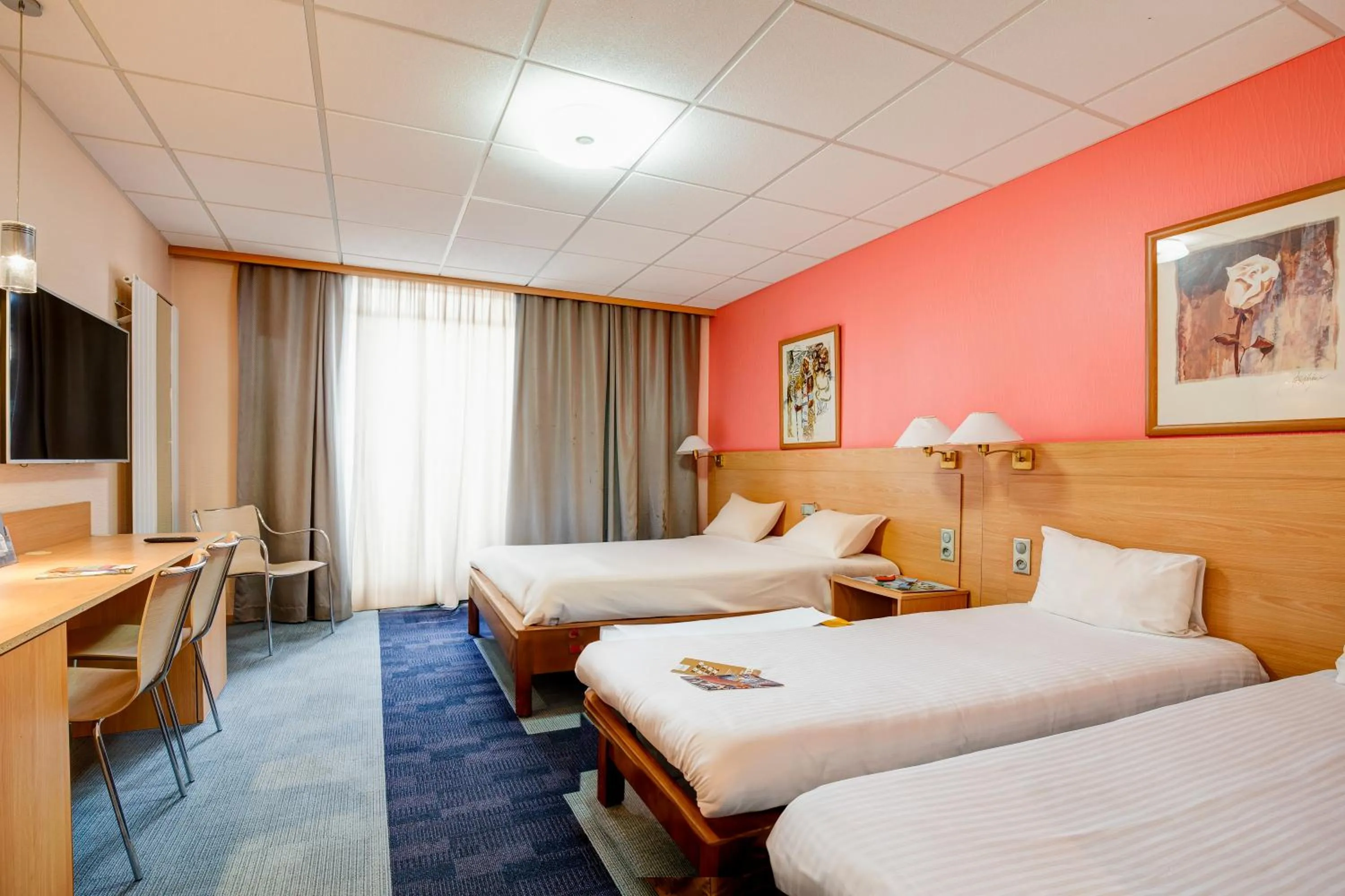 Bed in Kyriad Montbeliard Sochaux