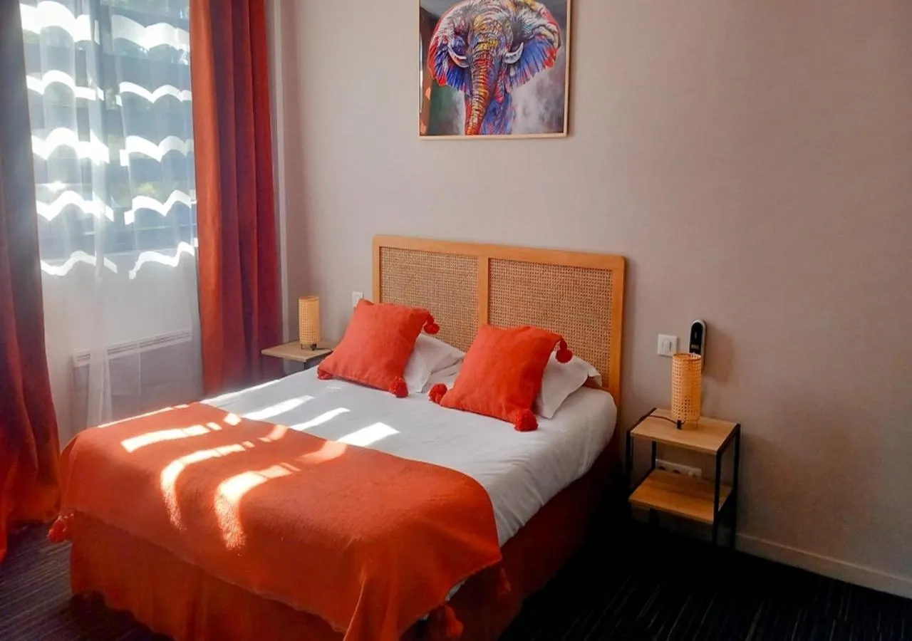 Bed in Les Jardins de L'Ocean - Climatisé