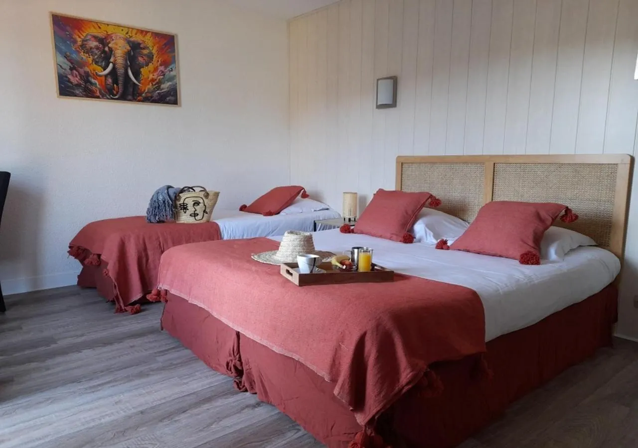 Bed in Les Jardins de L'Ocean - Climatisé