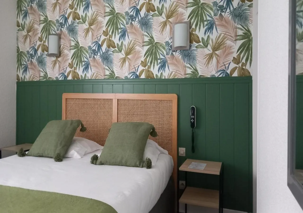 Bed in Les Jardins de L'Ocean - Climatisé